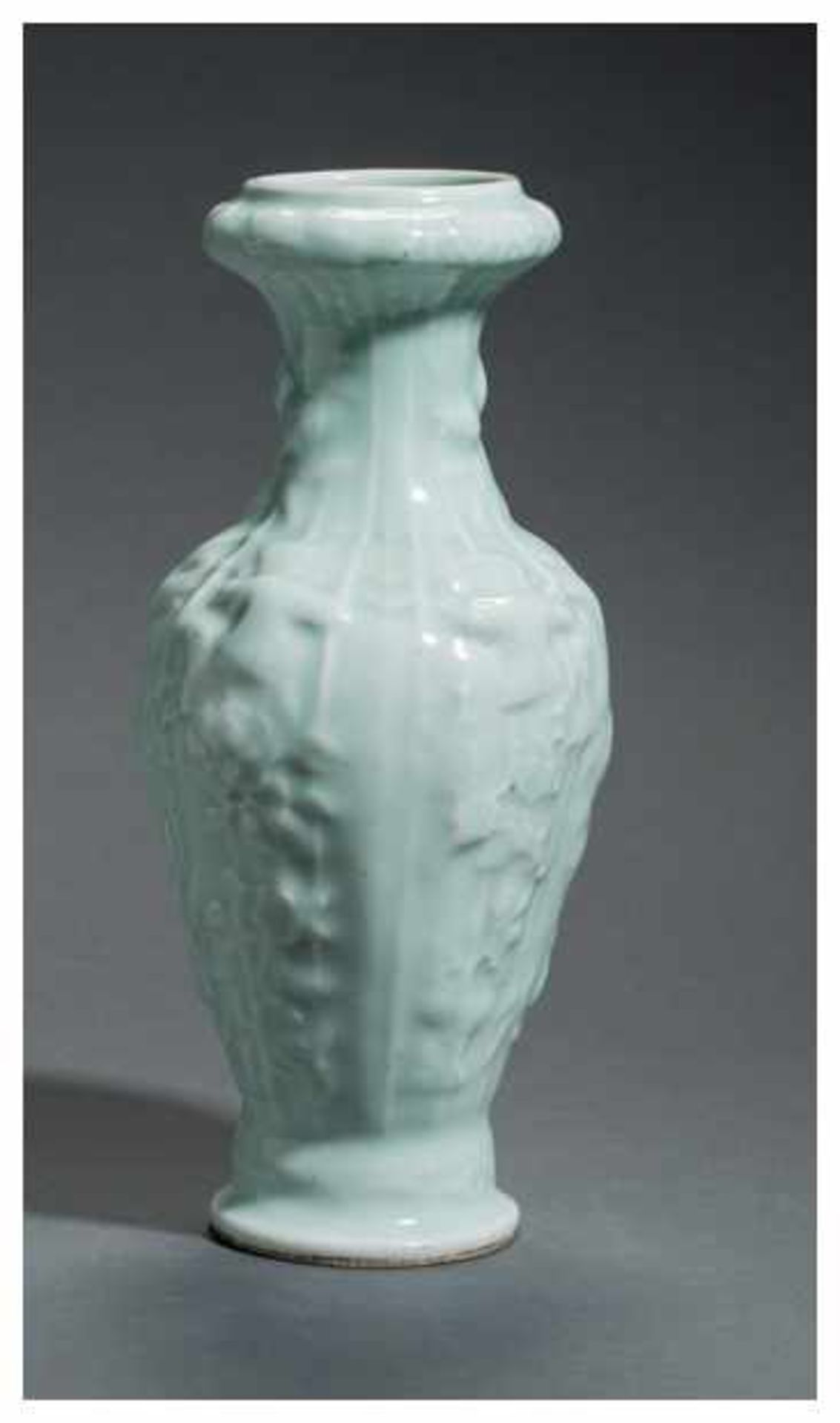 A LONGQUAN GLAZED VASE WITH HIGH RELIEF Glazed ceramic. China, 20th centuryAn attractive and - Image 2 of 3