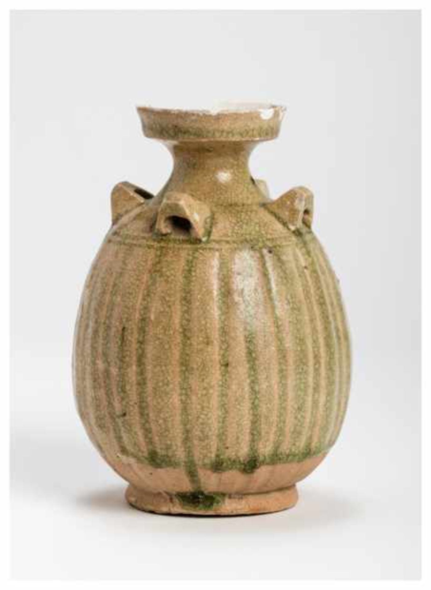 A CHINESE GLAZED CERAMIC GOURD-SHAPED VESSEL Glazed ceramic. China, Ming dynastyOvoid shape with