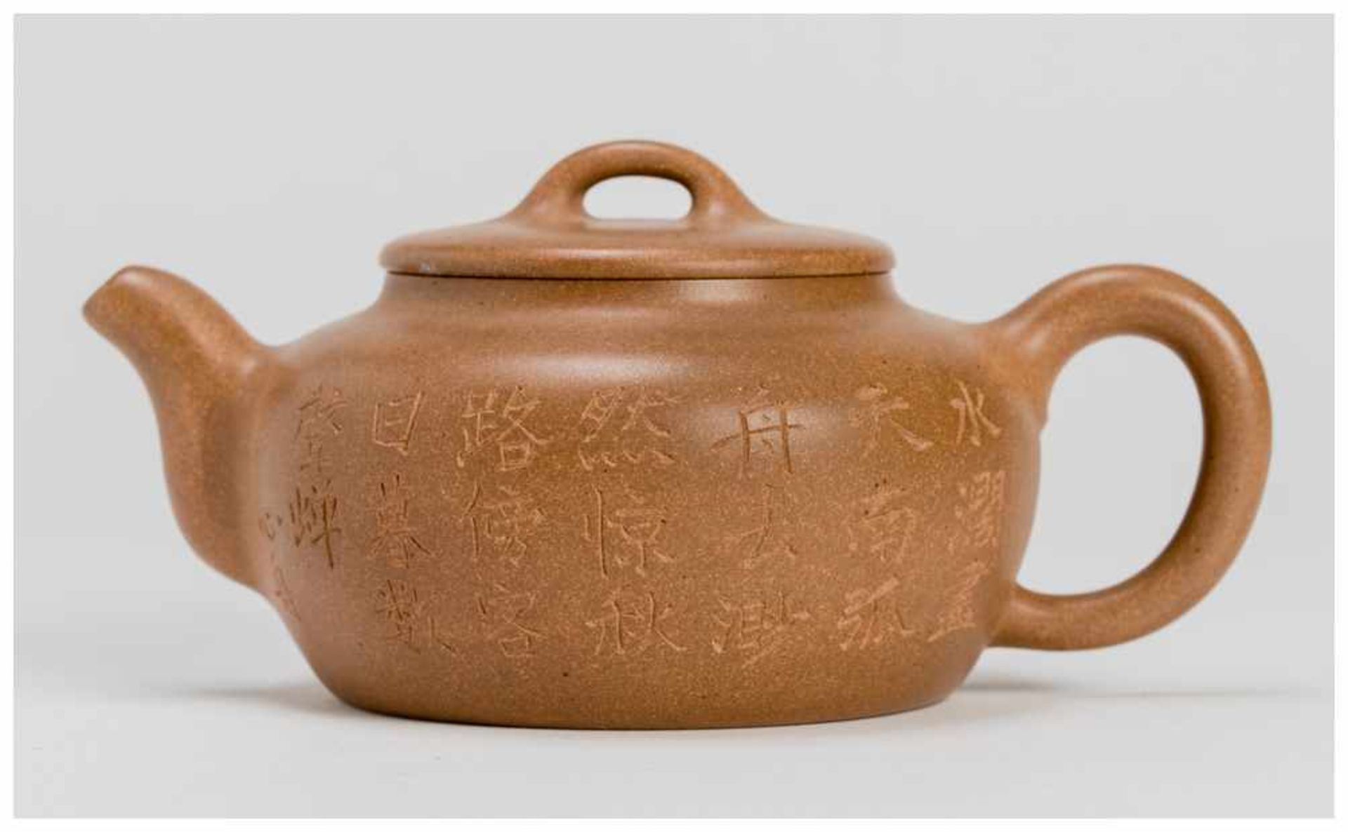 A YIXING TEAPOT Yixing ceramic. China, early 20th centuryOf classical tea pot form with lid,
