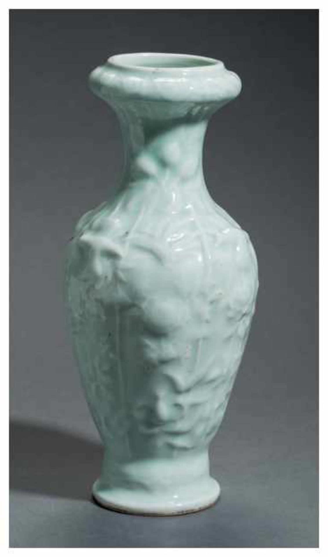 A LONGQUAN GLAZED VASE WITH HIGH RELIEF Glazed ceramic. China, 20th centuryAn attractive and