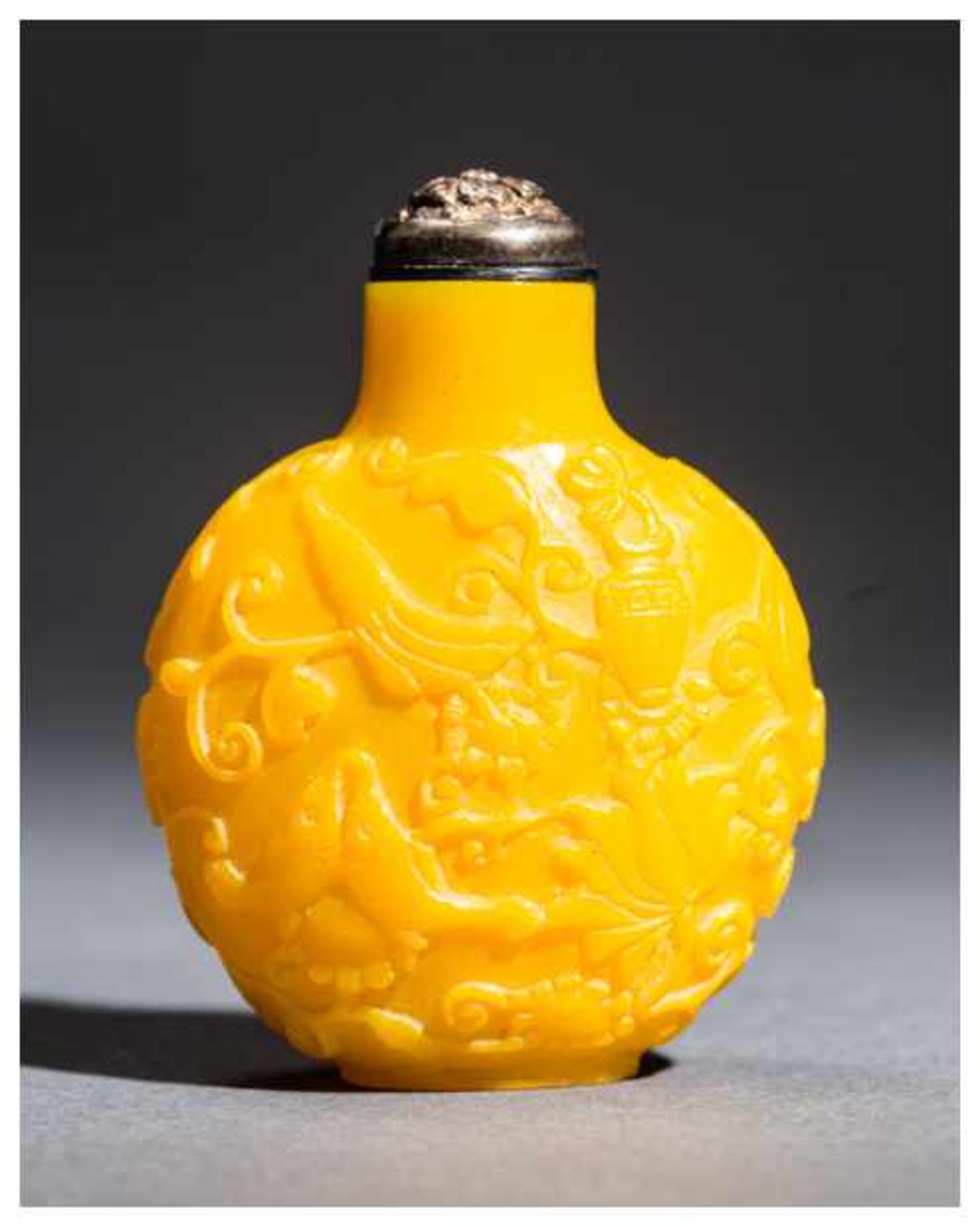 SNUFF BOTTLE WITH THE EIGHT BUDDHIST EMBLEMS Imperial yellow glass. China, 20th centuryThis round - Image 2 of 4