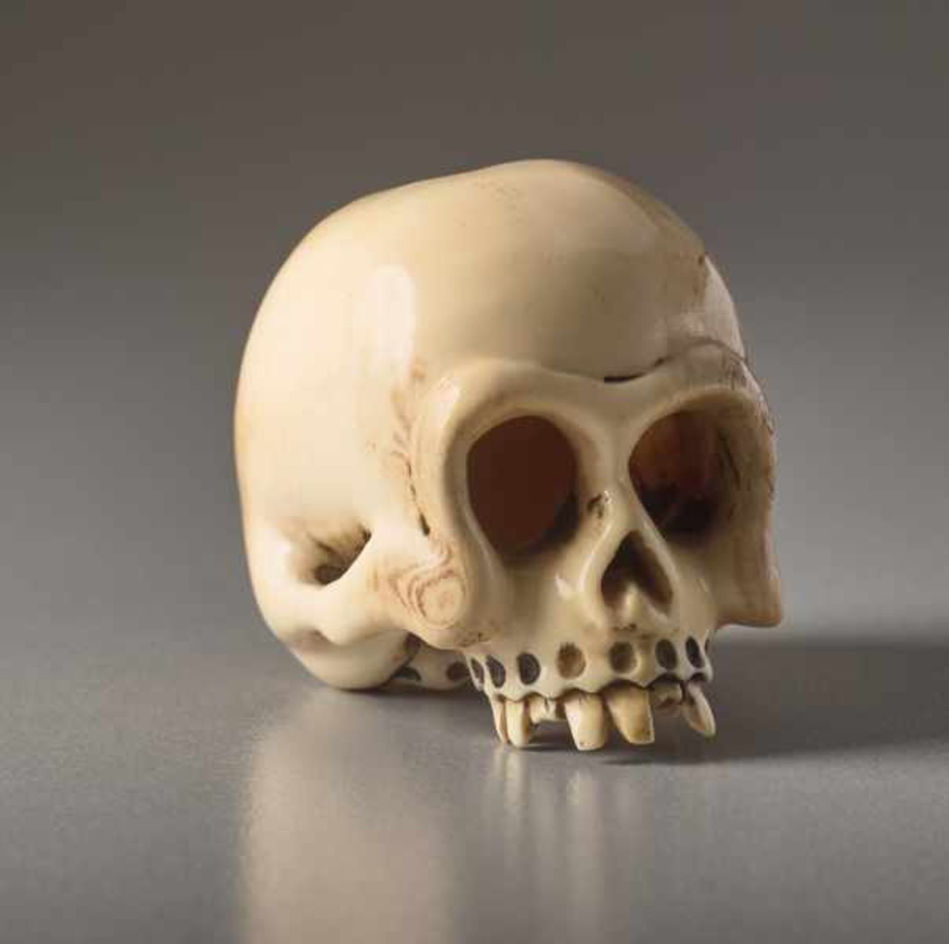 AN IVORY NETSUKE BY SHOZAN OF A SKULL Ivory netsuke. Japan, 19th centuryAn excellently crafted, - Image 6 of 7