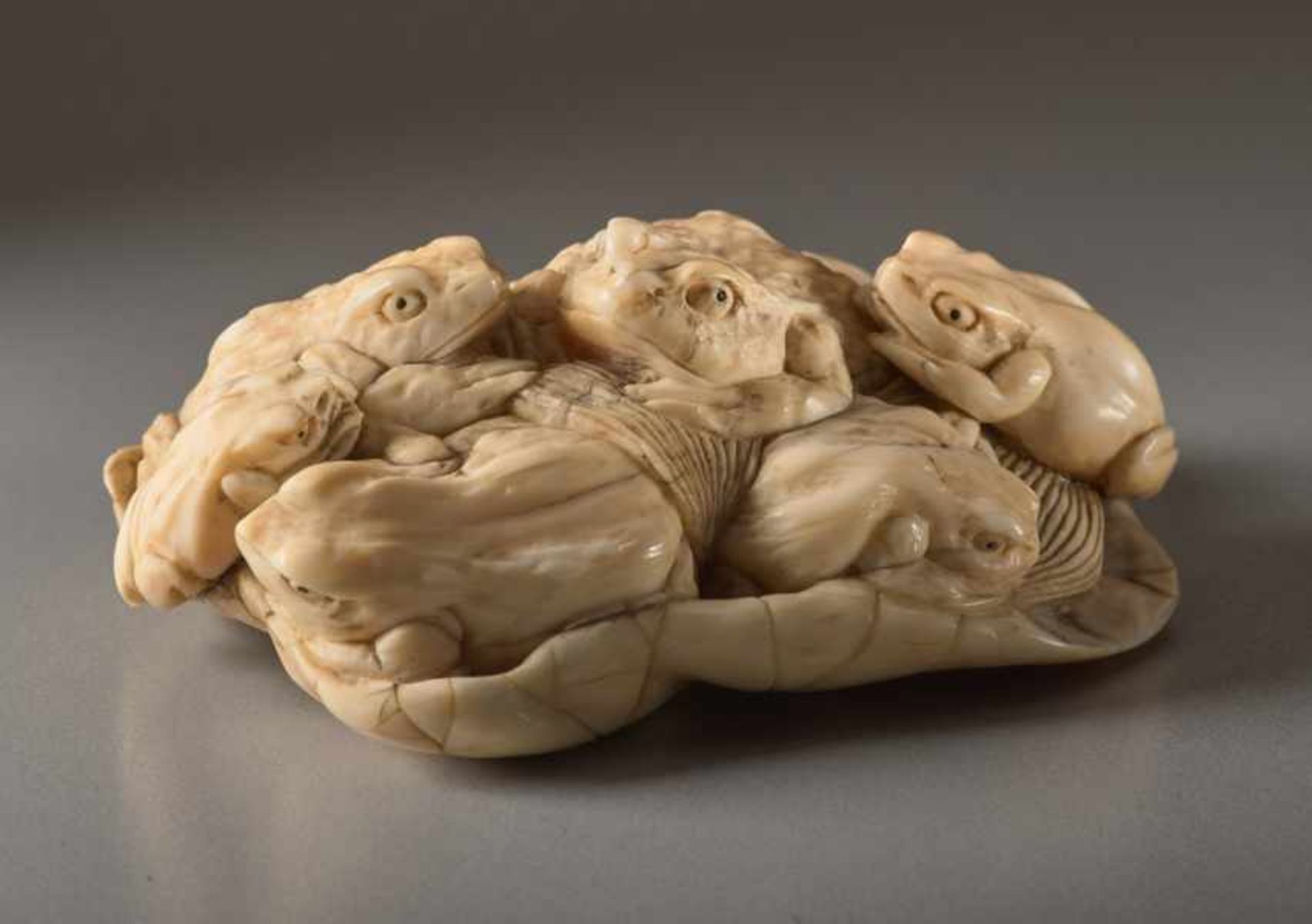 AN IVORY OKIMONO OF TOADS ON A LOTUS LEAF Ivory okimono. Japan, Meiji periodThe toad (gama) is a - Image 7 of 7