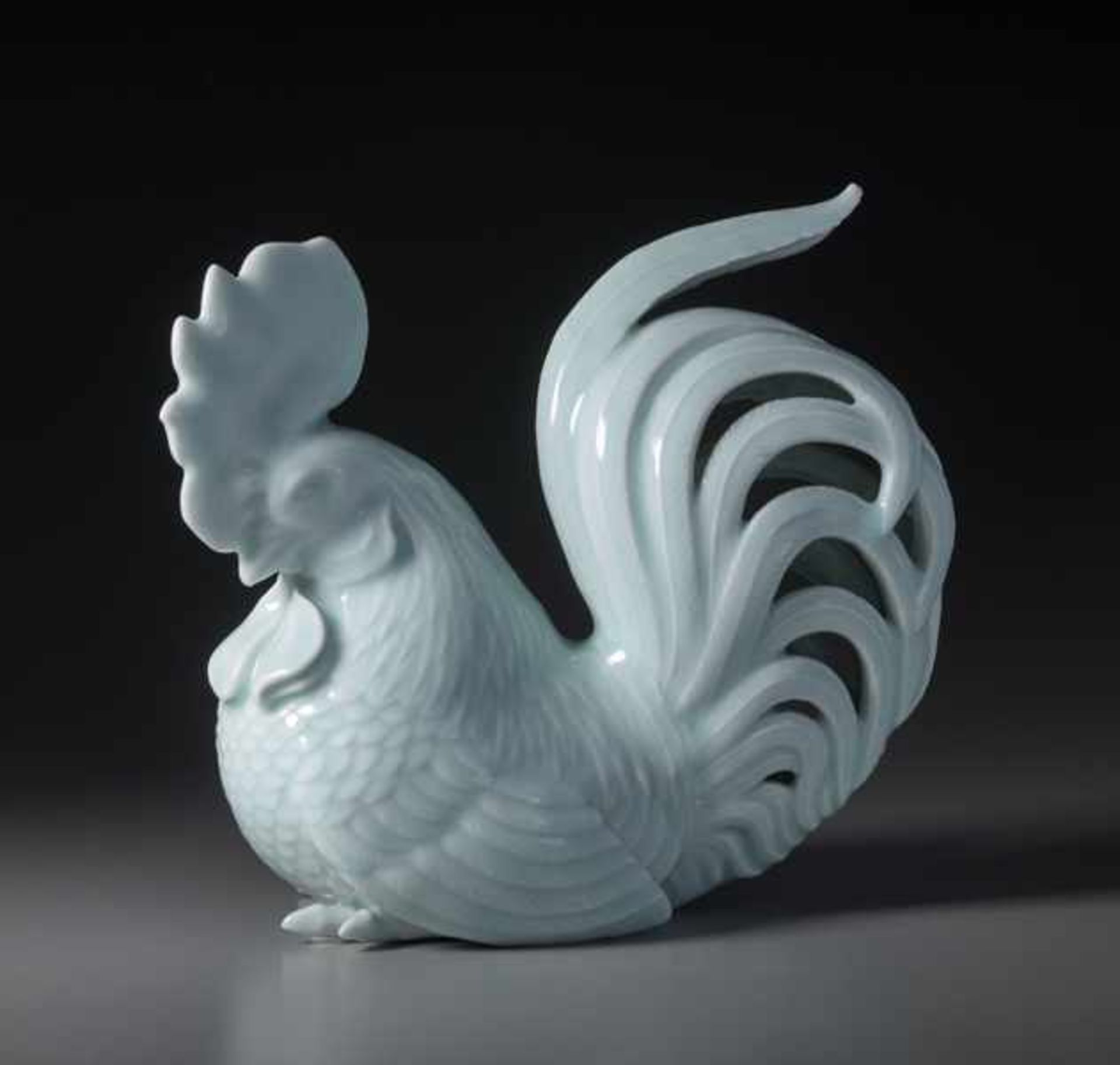 A PORCELAIN OKIMONO OF A COCKEREL Porcelain. Japan, Taisho periodBeautifully accomplished, with a