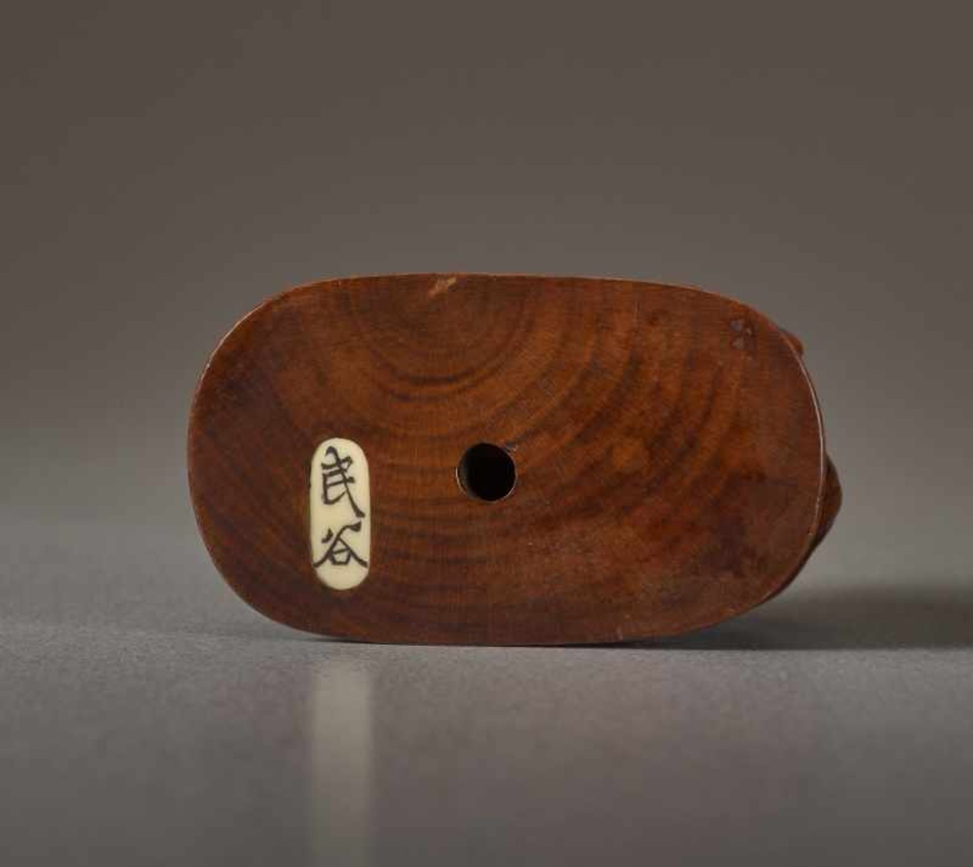 A WOOD NETSUKE BY MINKOKU OF A BOY AND OX Wood netsuke. Japan, 19th centuryA brawny ox with curved - Image 5 of 5