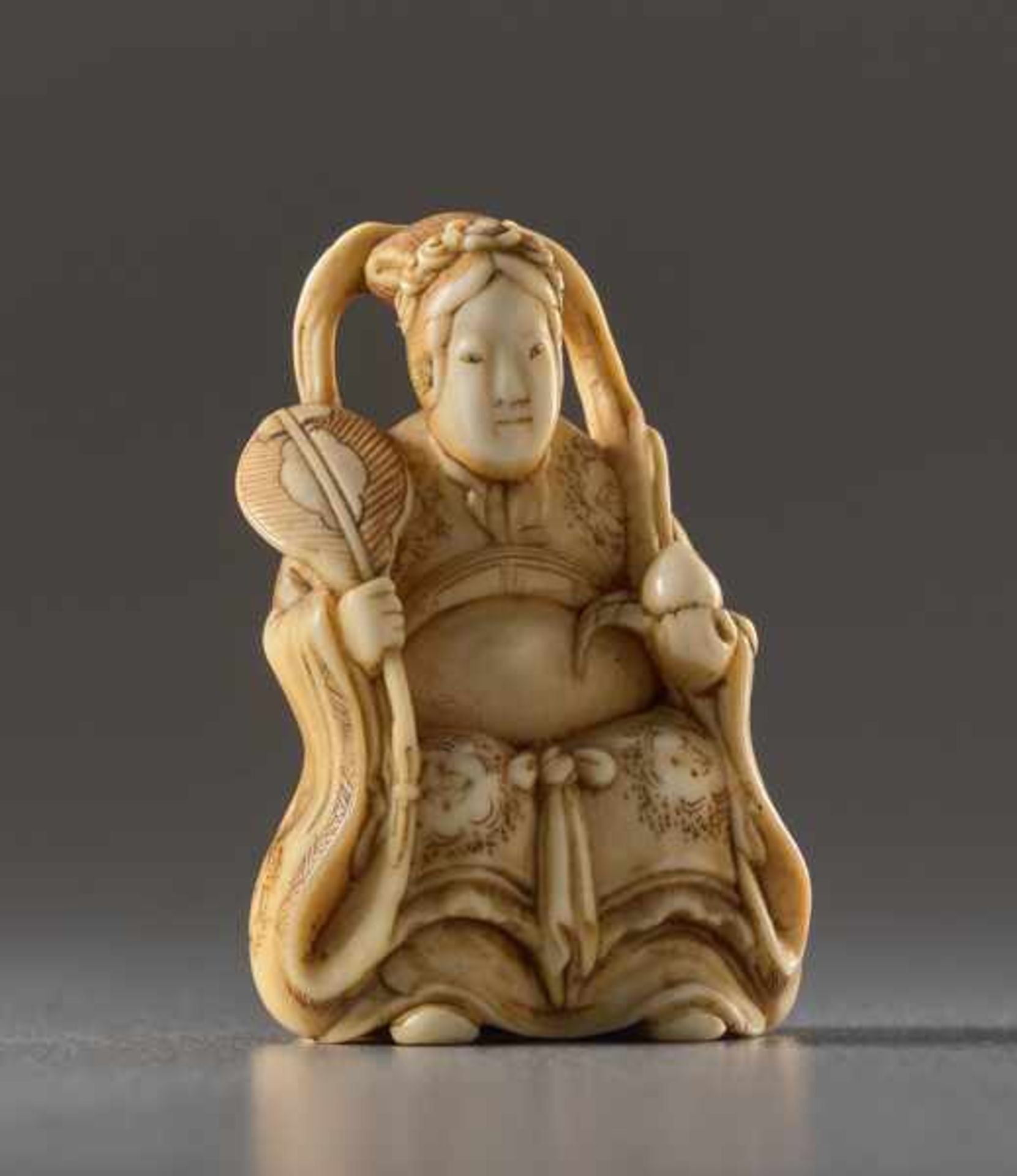 A SMALL IVORY NETSUKE OF SEIOBO Ivory netsuke. Japan, 19th centuryAn extraordinarily fine work