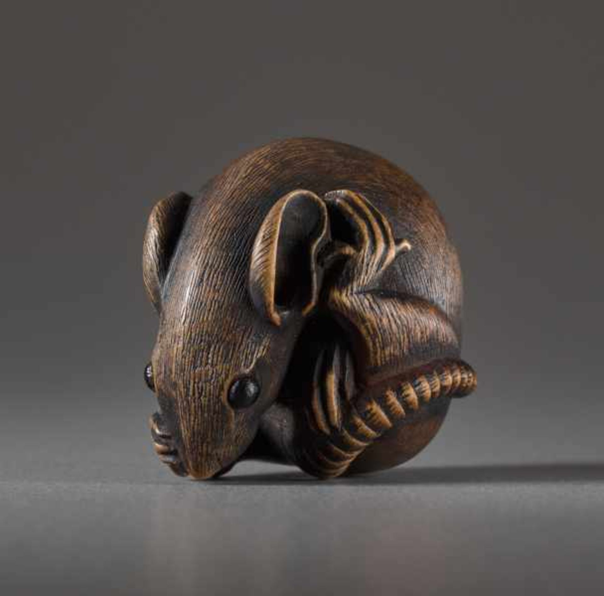 A WOOD NETSUKE BY MASANAO OF A RAT Wood netsuke. Japan, 19th centuryThe famous ‘Masanao rat’ has - Image 2 of 5