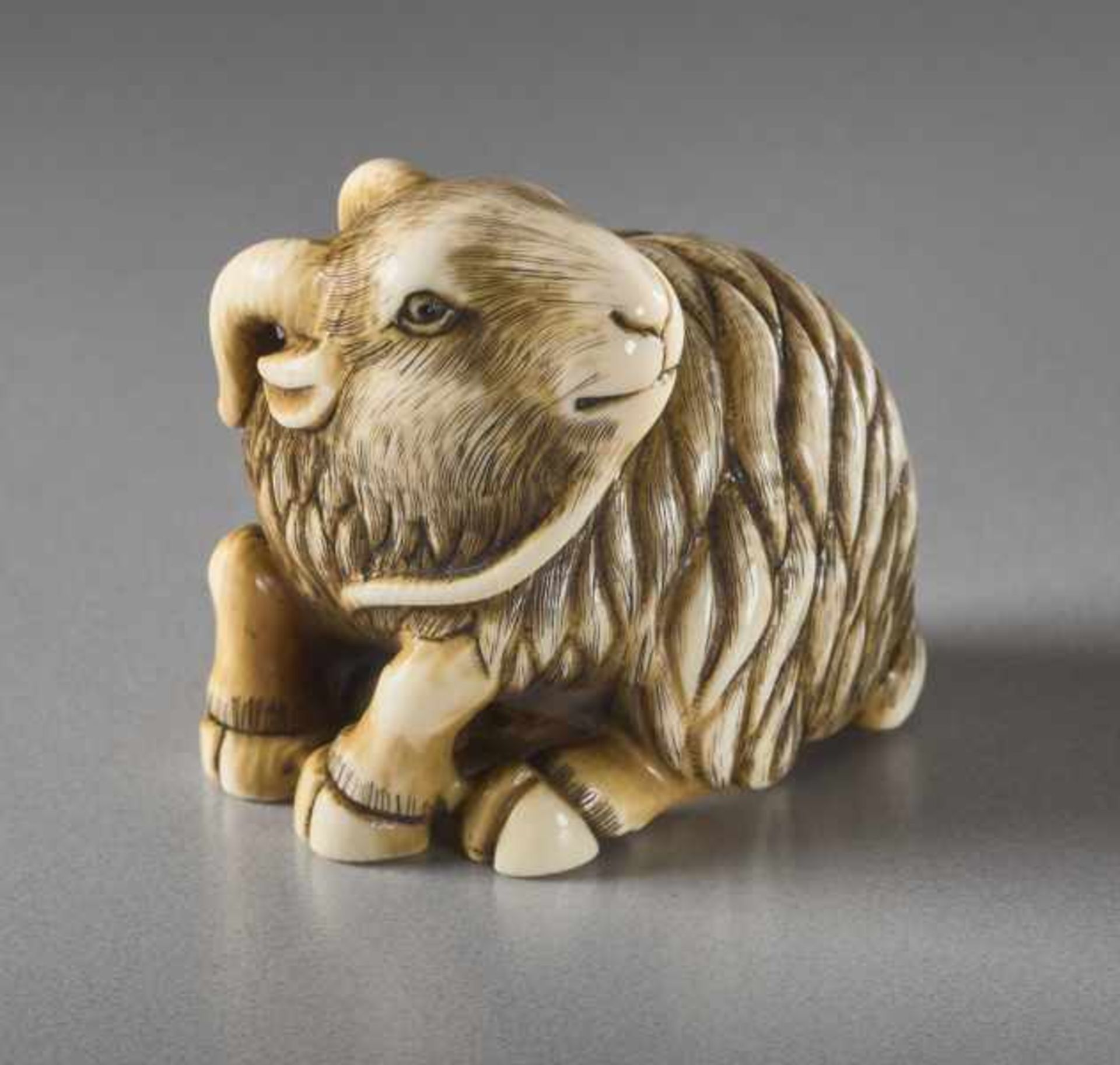 AN IVORY NETSUKE BY KANGYOKU OF A GOAT Ivory netsuke. Japan, 20th centuryKangyoku is one of the - Image 2 of 6