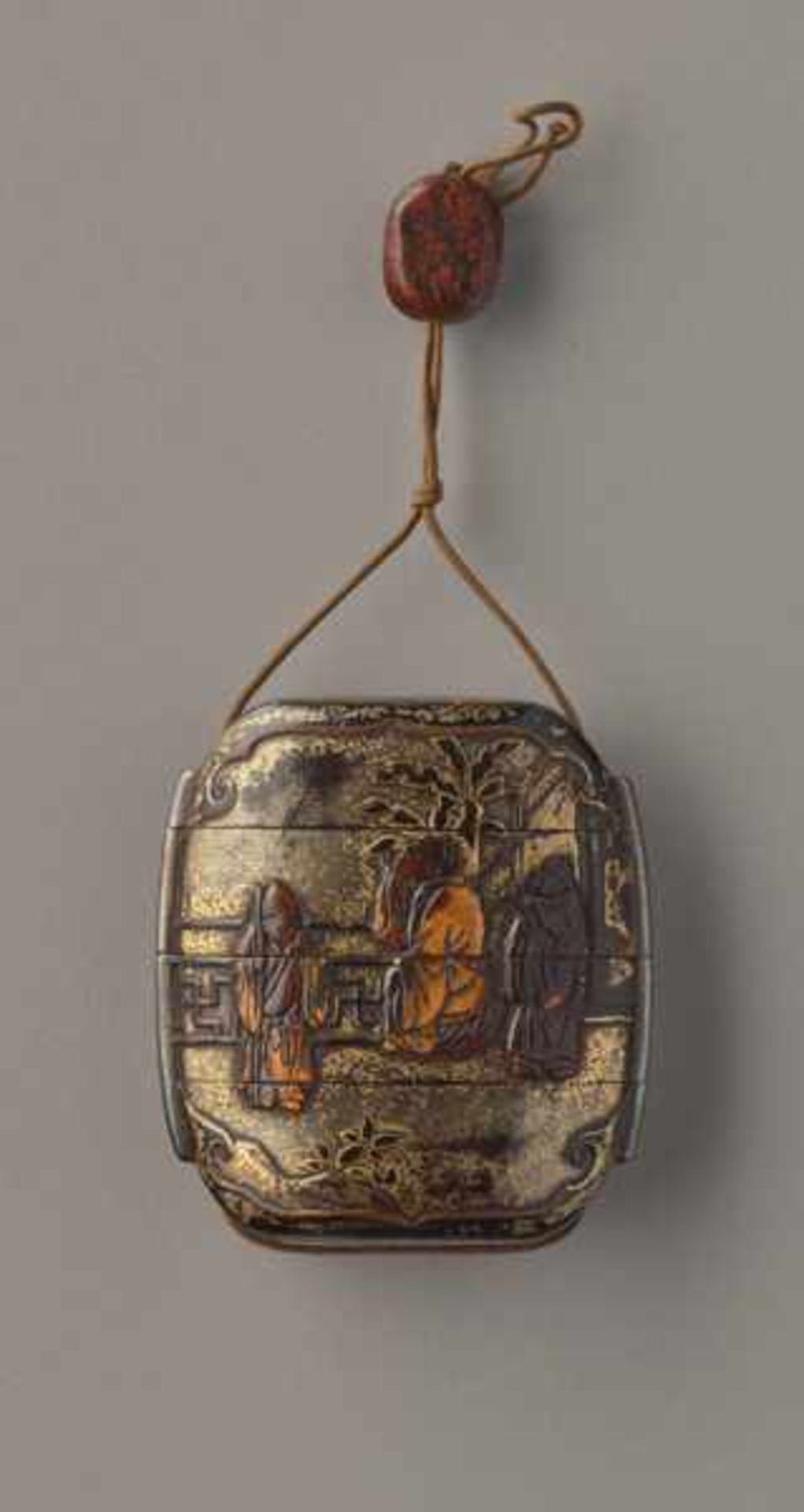 A THREE CASE LACQUER AND GOLD INRO OF A PALACE GARDEN SCENE Lacquer, horn and gold inro, lacquer