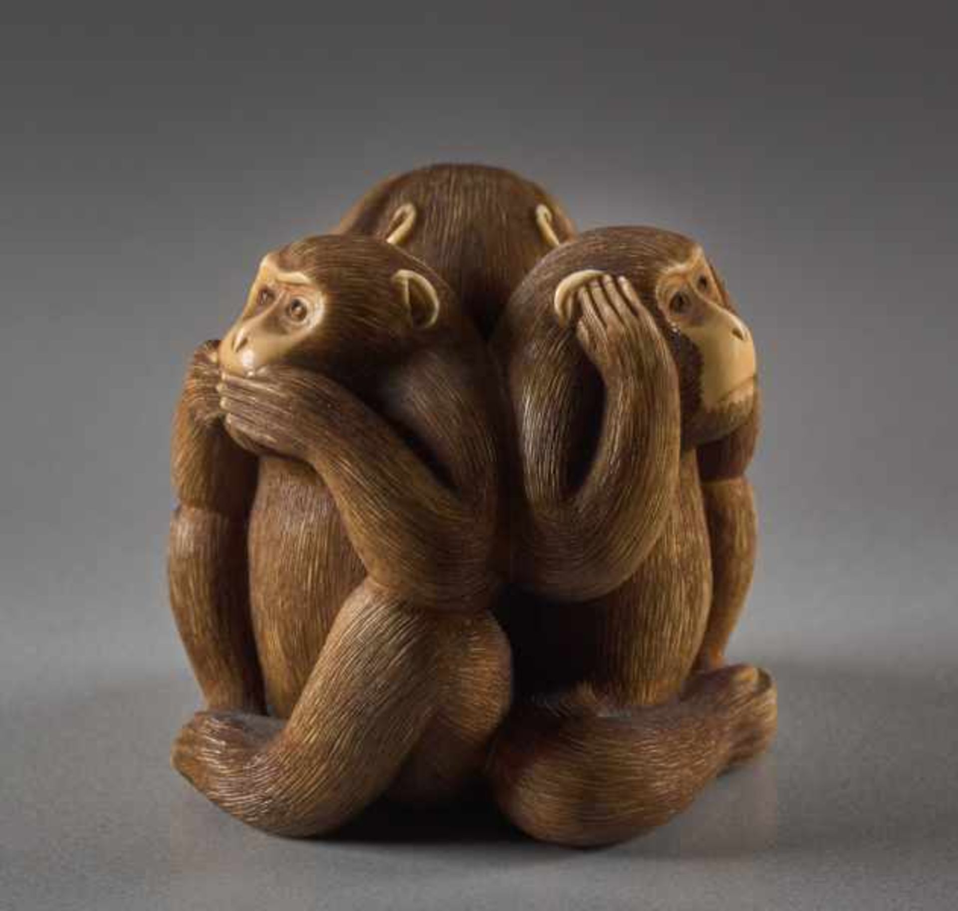 AN IVORY NETSUKE OF THE THREE WISE MONKEYS BY IKKOSAI Ivory netsuke. Japan, Meiji periodThe three - Image 4 of 5