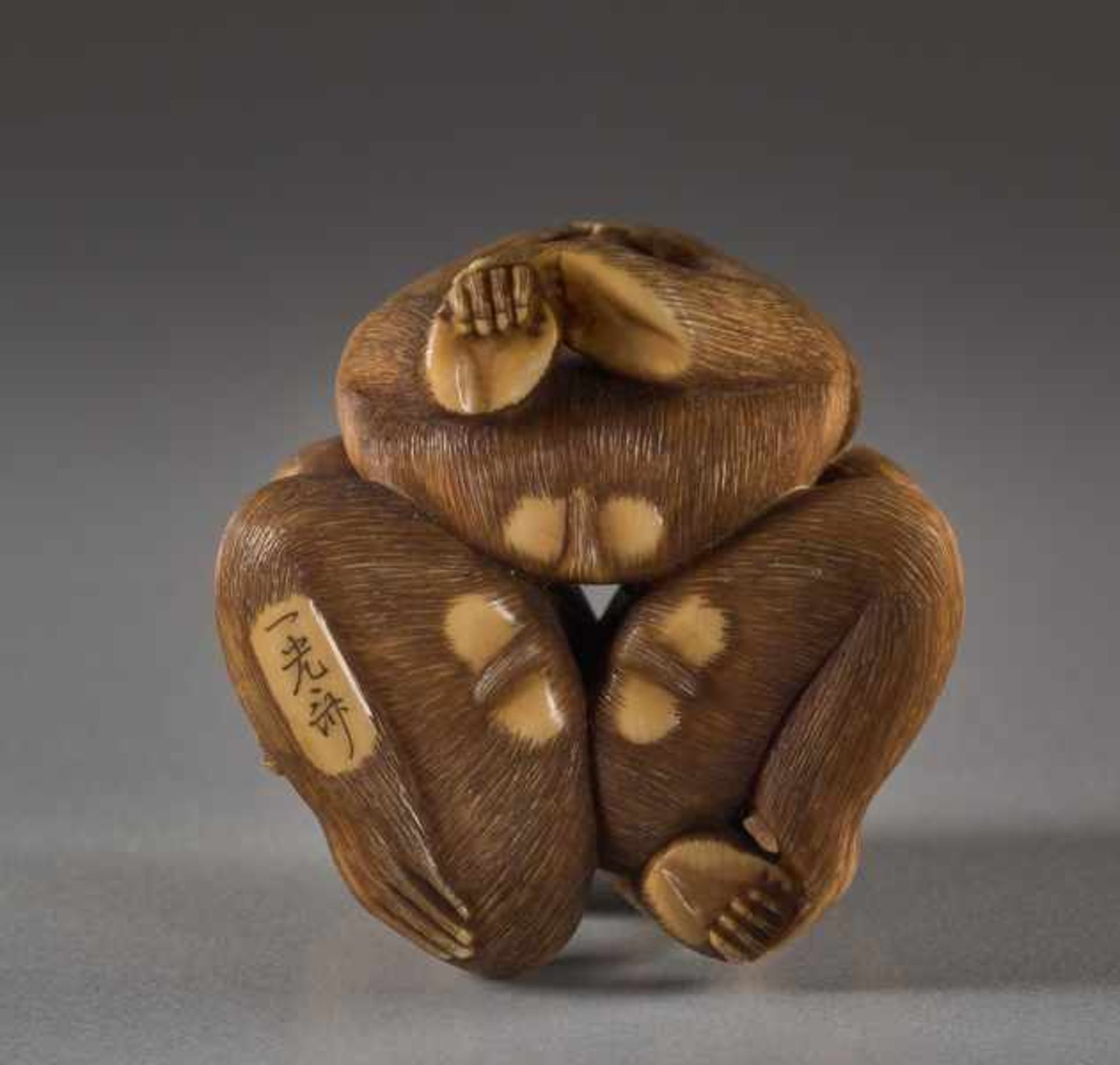 AN IVORY NETSUKE OF THE THREE WISE MONKEYS BY IKKOSAI Ivory netsuke. Japan, Meiji periodThe three - Image 5 of 5