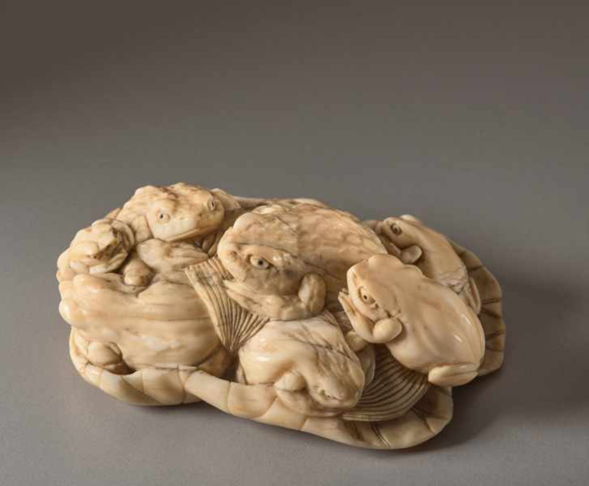 AN IVORY OKIMONO OF TOADS ON A LOTUS LEAF Ivory okimono. Japan, Meiji periodThe toad (gama) is a - Image 5 of 7