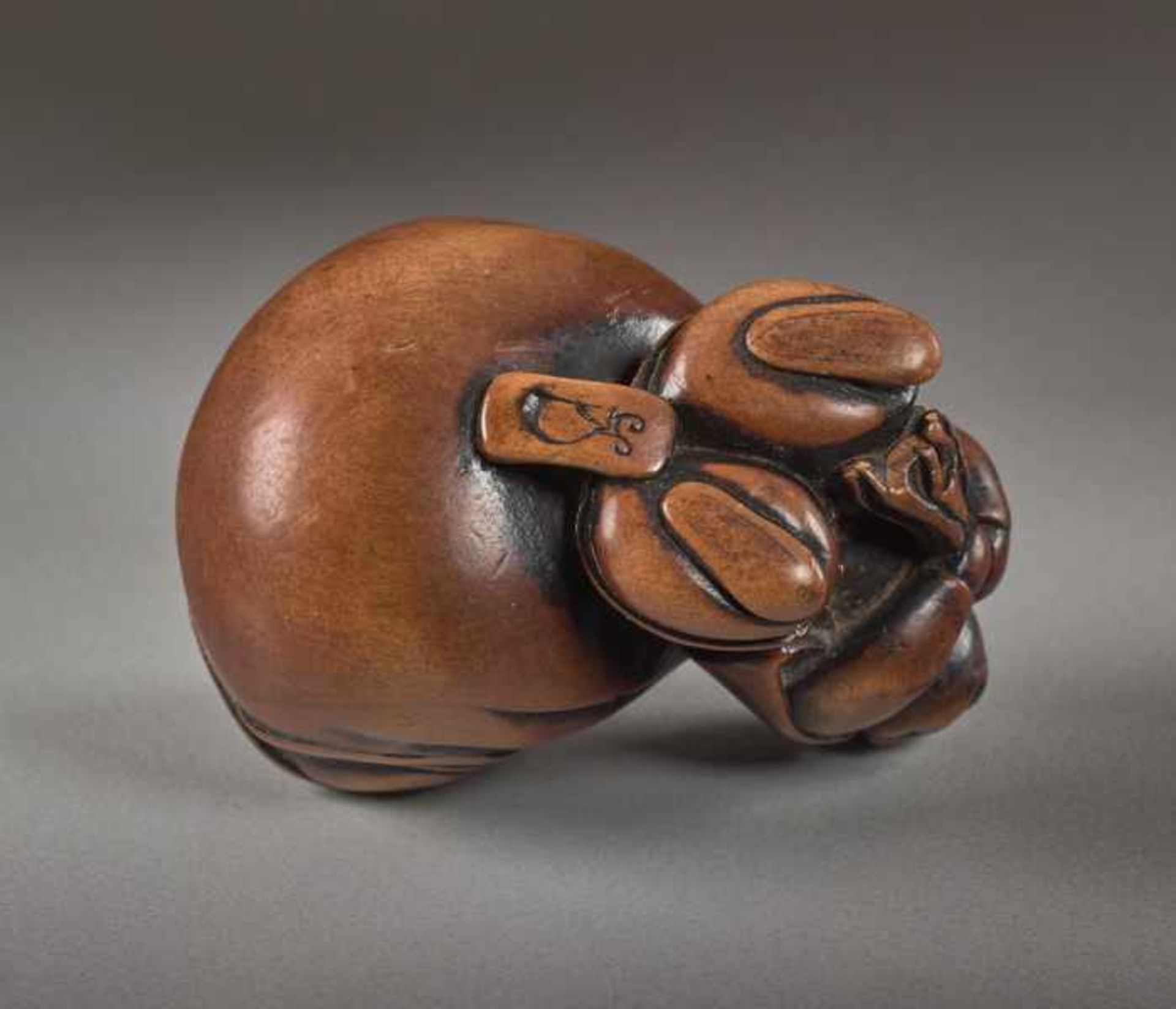A WOOD NETSUKE OF HOTEI Wood netsuke. Japan, 19th centuryThe ever-laughing Hotei, the most popular - Image 5 of 5
