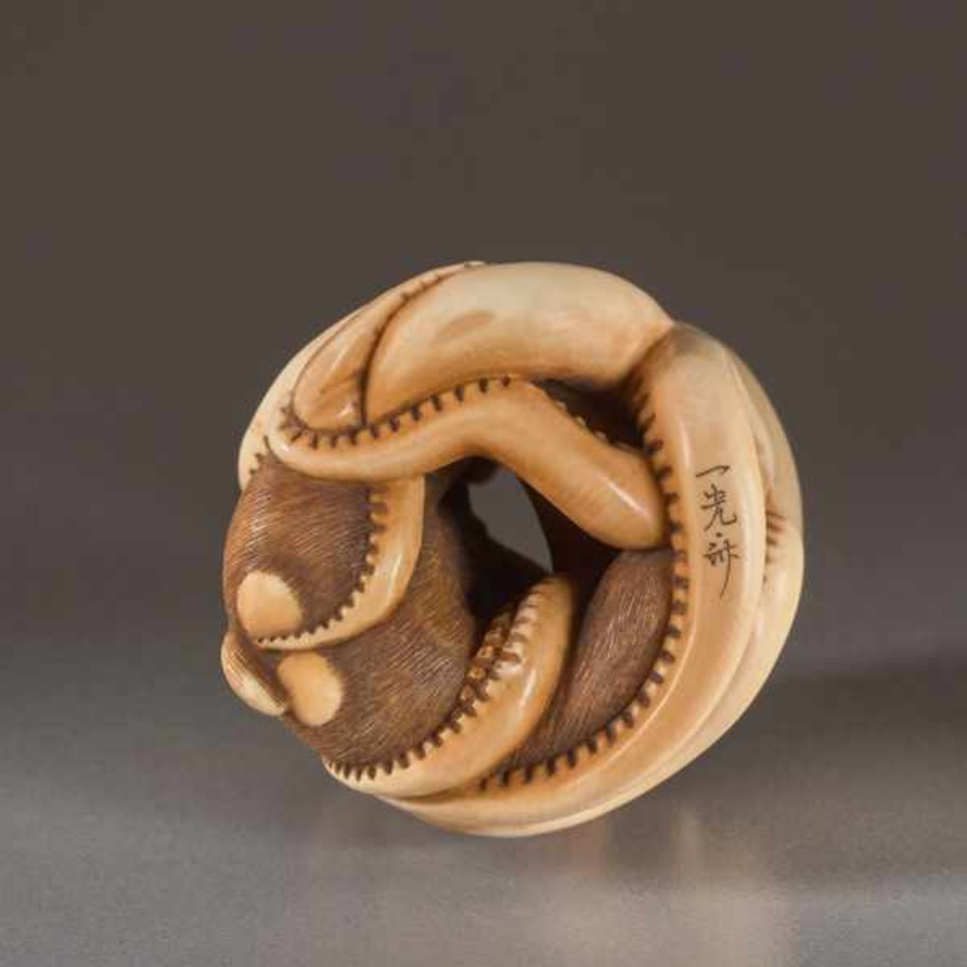 AN IVORY NETSUKE BY IKKOSAI TOUN OF A MONKEY AND OCTOPUS Ivory netsuke. Japan, 19th century, Meiji - Image 4 of 4