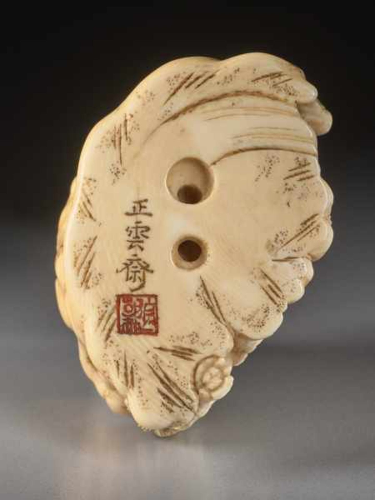 AN IVORY NETSUKE BY SHOUNSAI OF SHISHI PLAYING IN PEONY GROVE Ivory netsuke. Japan, 19th - Image 5 of 5