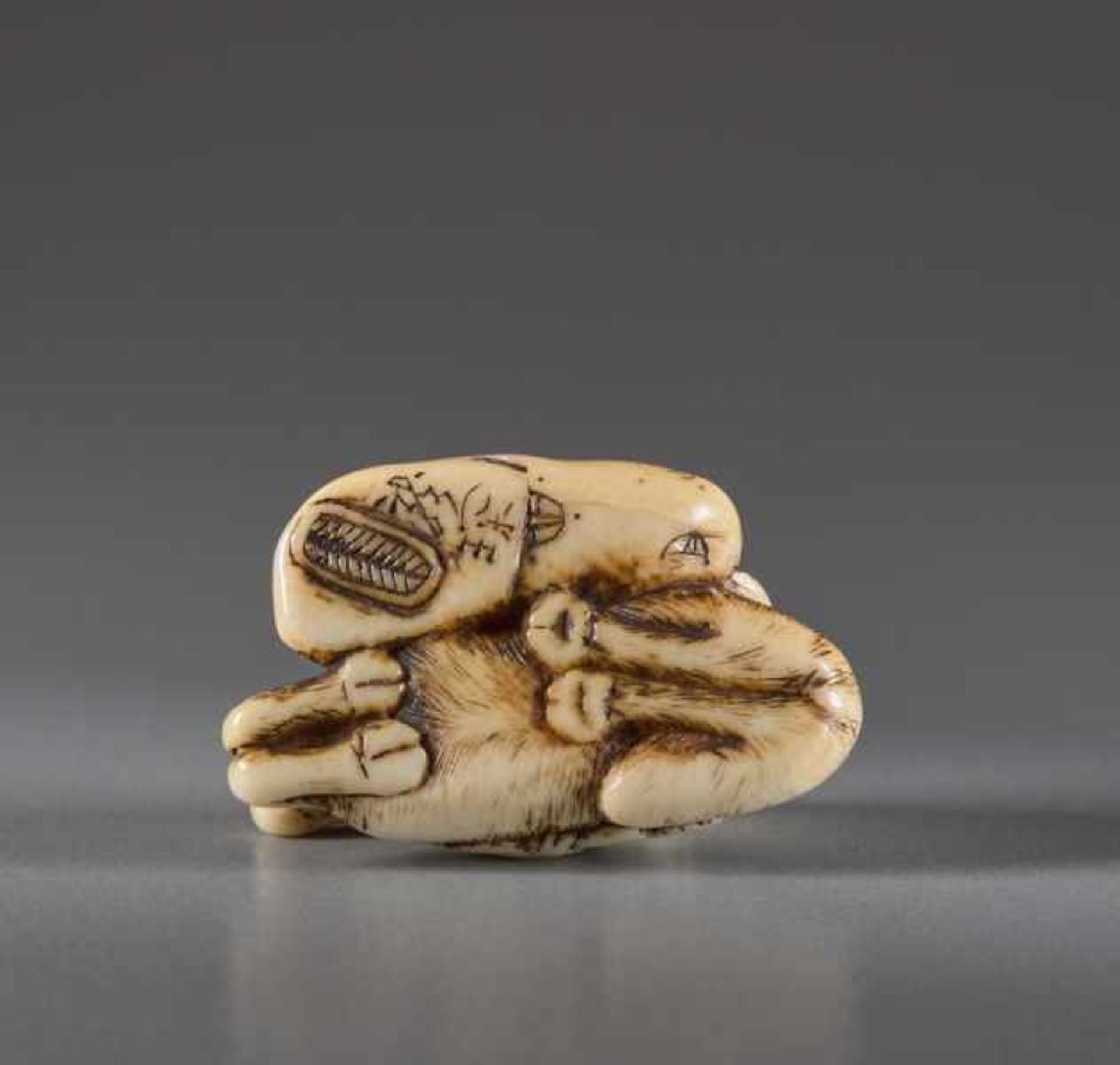 A SMALL IVORY NETSUKE BY RYUO OF FUKUROKUJU Ivory netsuke. Japan, 18th centuryFukurokuju is depicted - Image 6 of 6