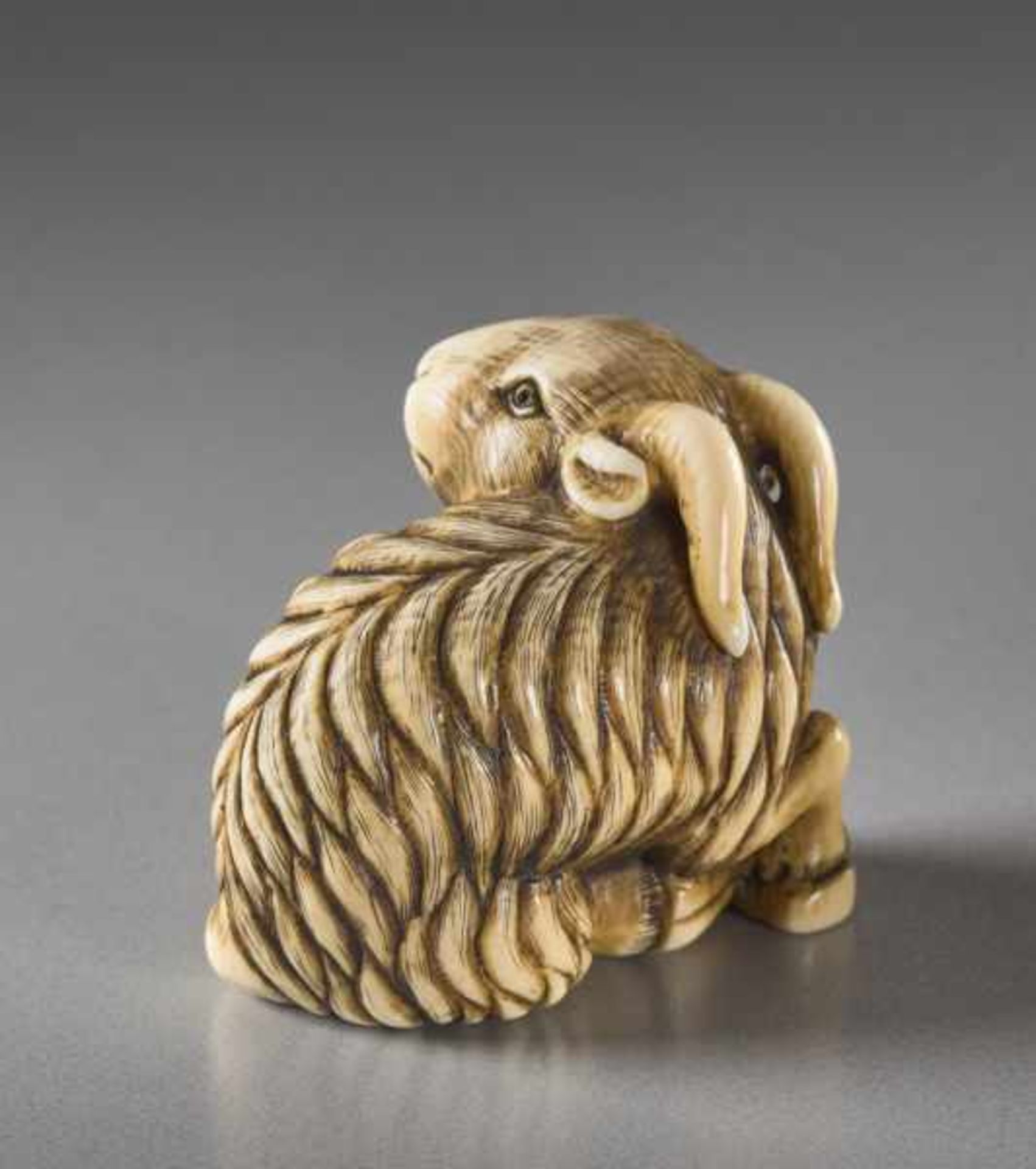 AN IVORY NETSUKE BY KANGYOKU OF A GOAT Ivory netsuke. Japan, 20th centuryKangyoku is one of the - Image 4 of 6