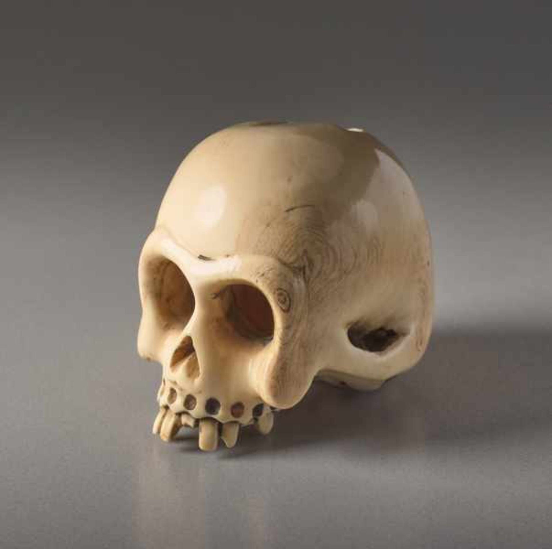 AN IVORY NETSUKE BY SHOZAN OF A SKULL Ivory netsuke. Japan, 19th centuryAn excellently crafted, - Image 5 of 7