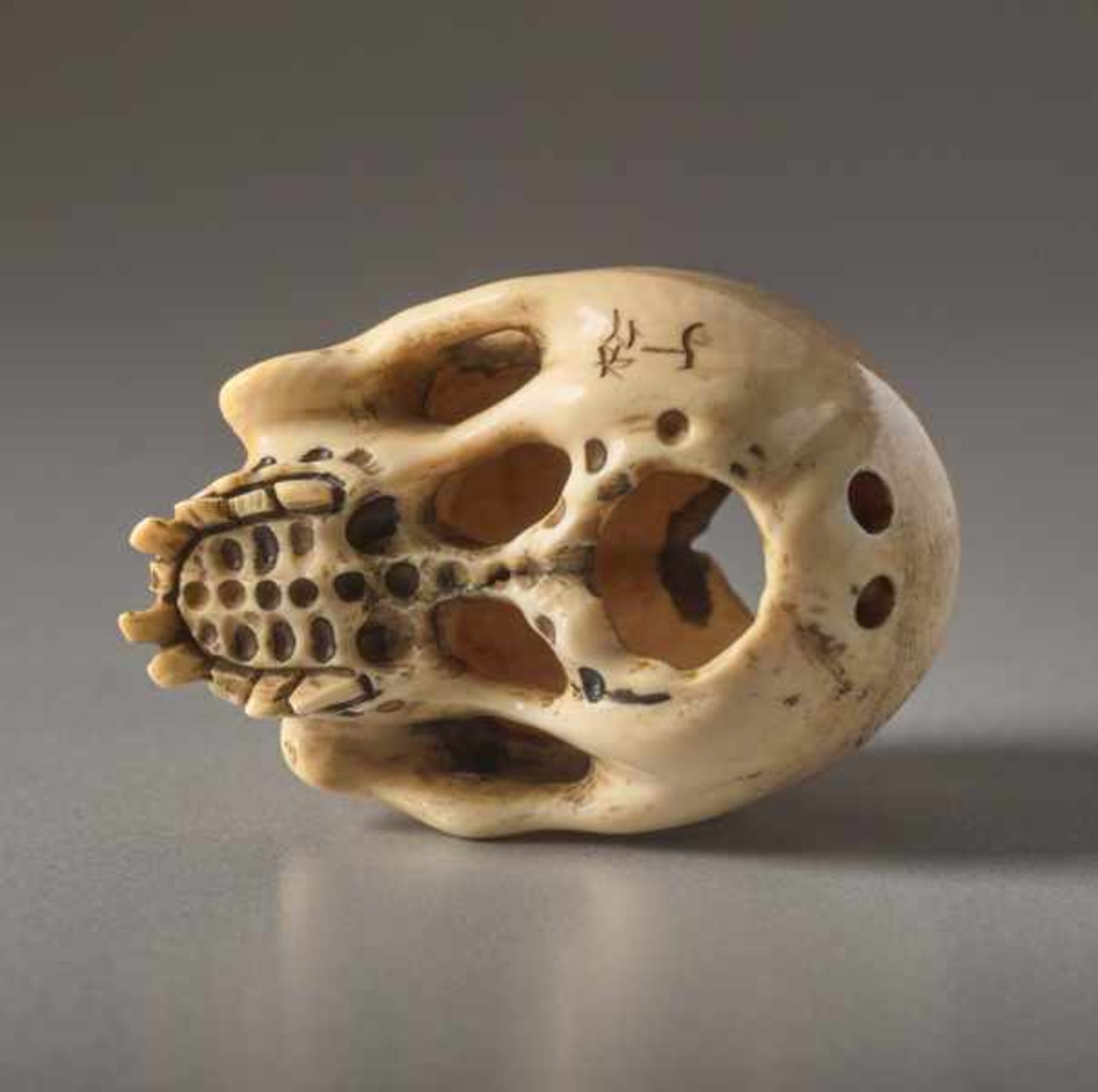 AN IVORY NETSUKE BY SHOZAN OF A SKULL Ivory netsuke. Japan, 19th centuryAn excellently crafted, - Image 7 of 7