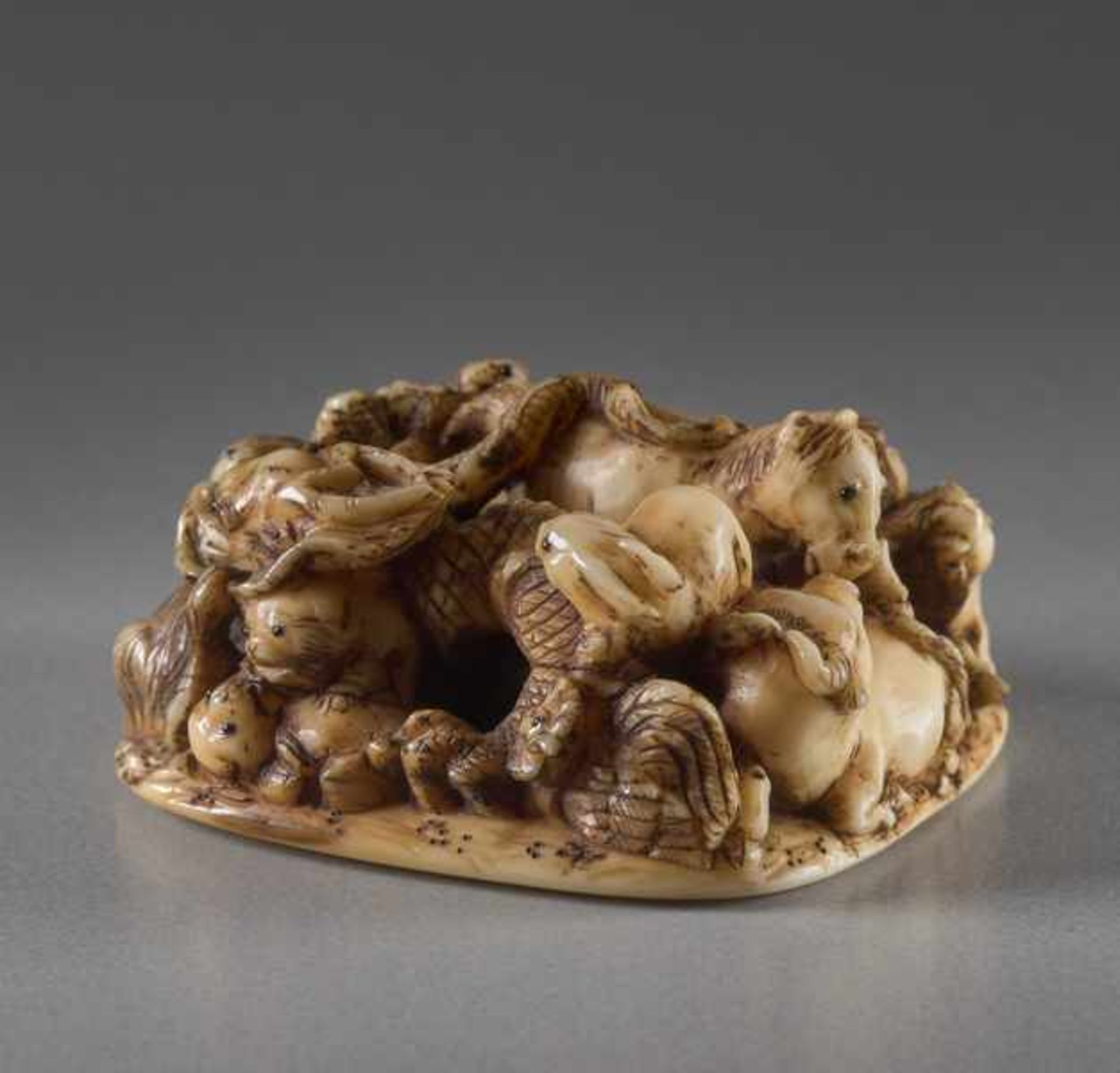 AN IVORY NETSUKE OF THE ZODIAC BY MASAMITSU Ivory netsuke. Japan, Meiji periodOf compact design, - Image 4 of 5