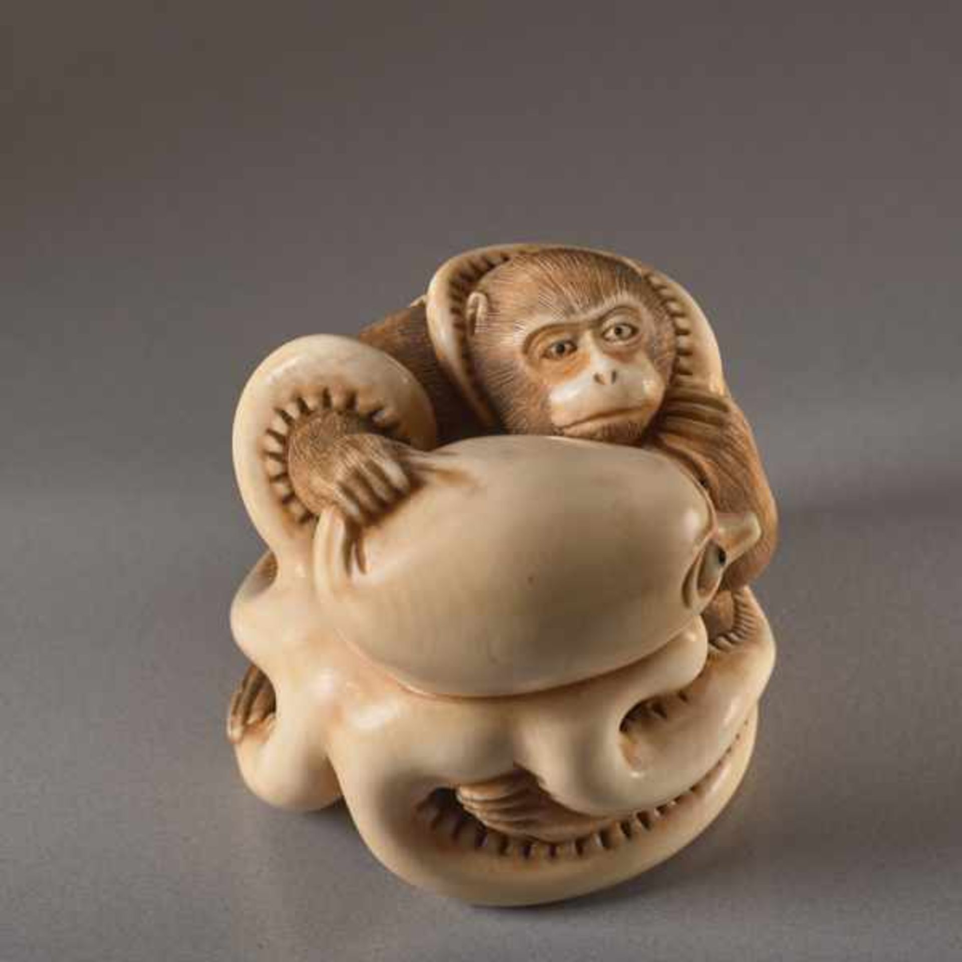 AN IVORY NETSUKE BY IKKOSAI TOUN OF A MONKEY AND OCTOPUS Ivory netsuke. Japan, 19th century, Meiji - Image 3 of 4