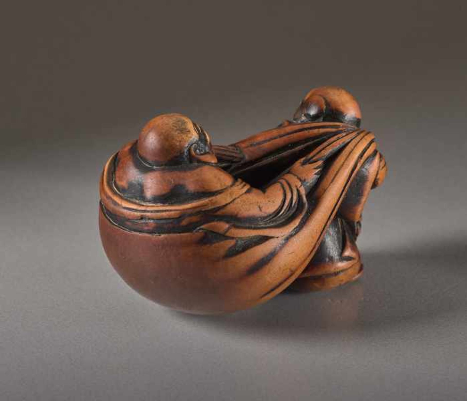 A WOOD NETSUKE OF HOTEI Wood netsuke. Japan, 19th centuryThe ever-laughing Hotei, the most popular - Image 3 of 5