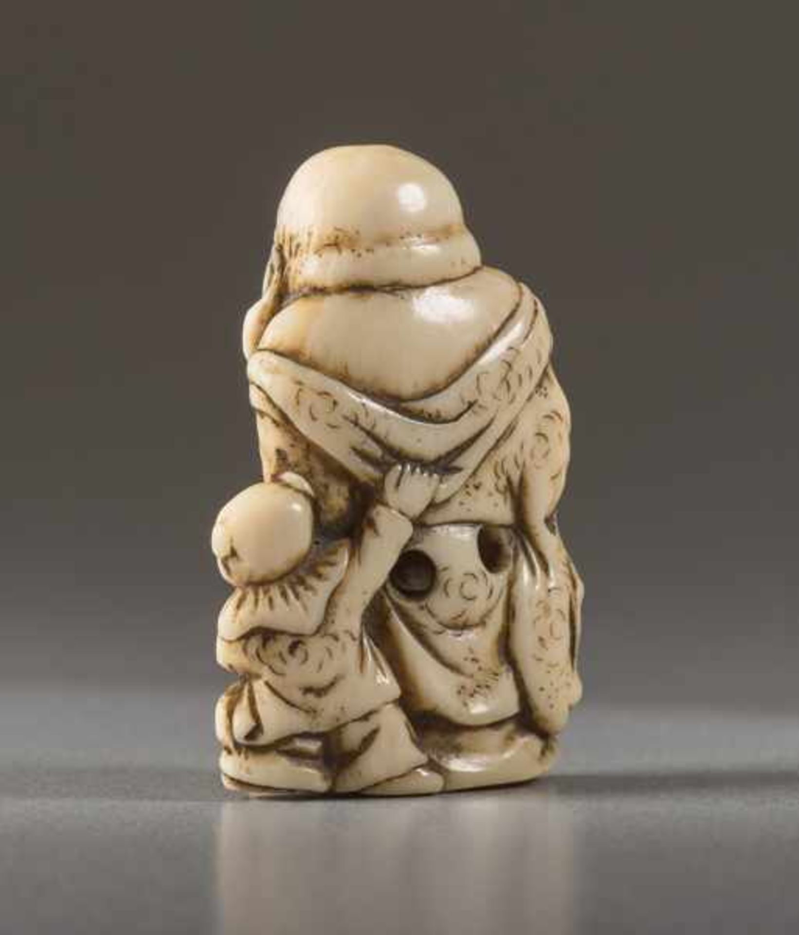 A SMALL IVORY NETSUKE OF HOTEI Ivory netsuke. Japan, early 19th centuryA delightful depiction of - Image 5 of 6