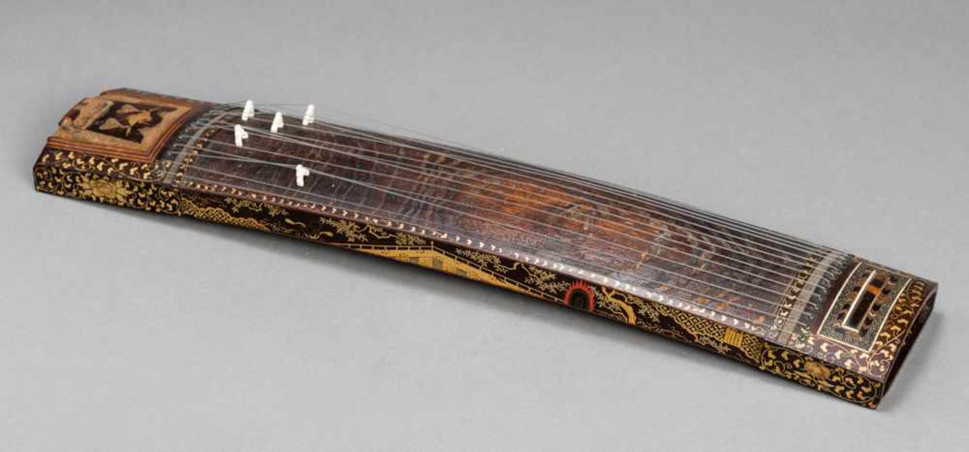 A FINE LACQUERED KOTO Wood, lacquer and bone. Japan, 19th centuryA traditional thirteen-string