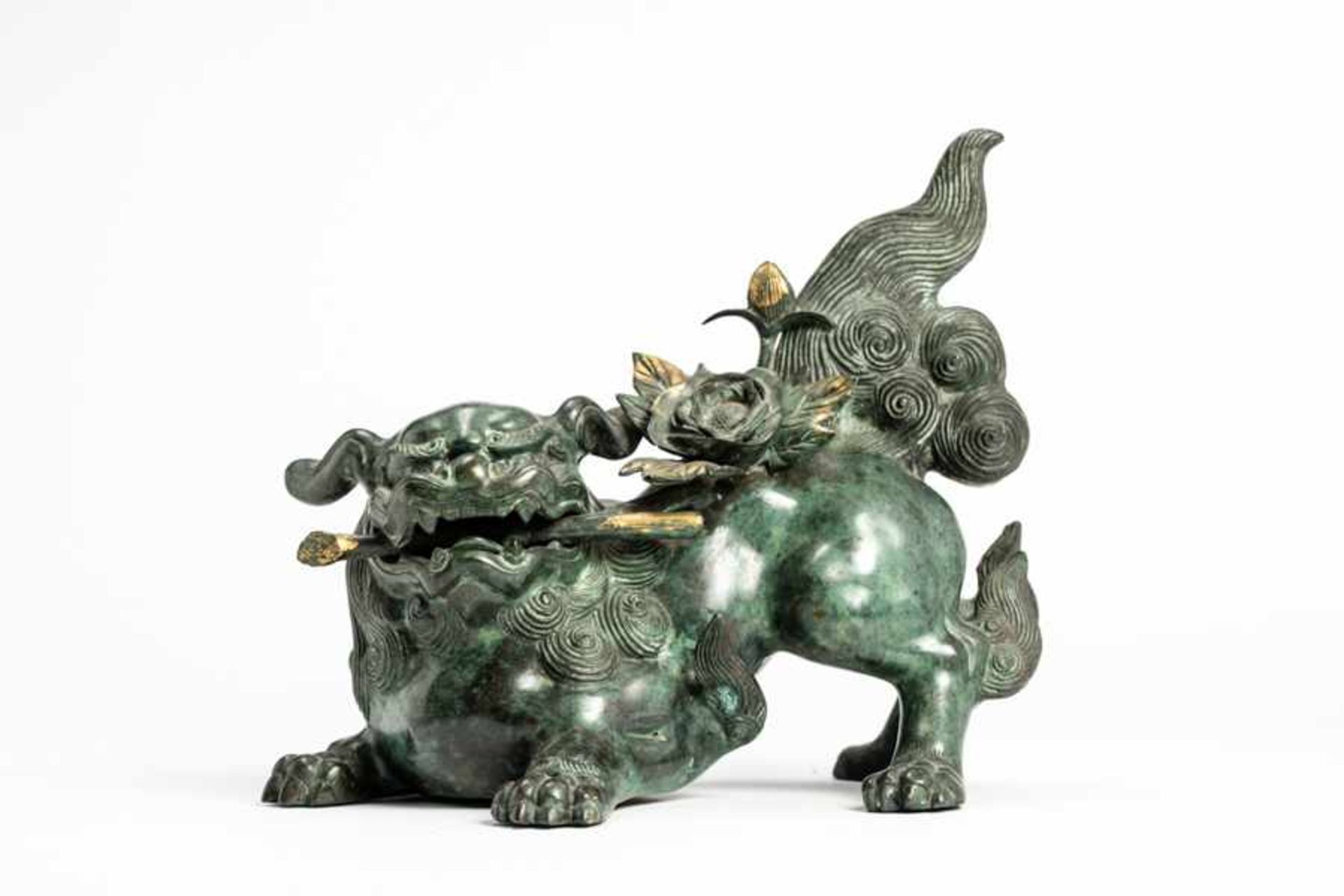 A BRONZE SHISHI Bronze with gilding. Japan, 19th centuryOf beautiful greenish patina, the former - Image 2 of 9