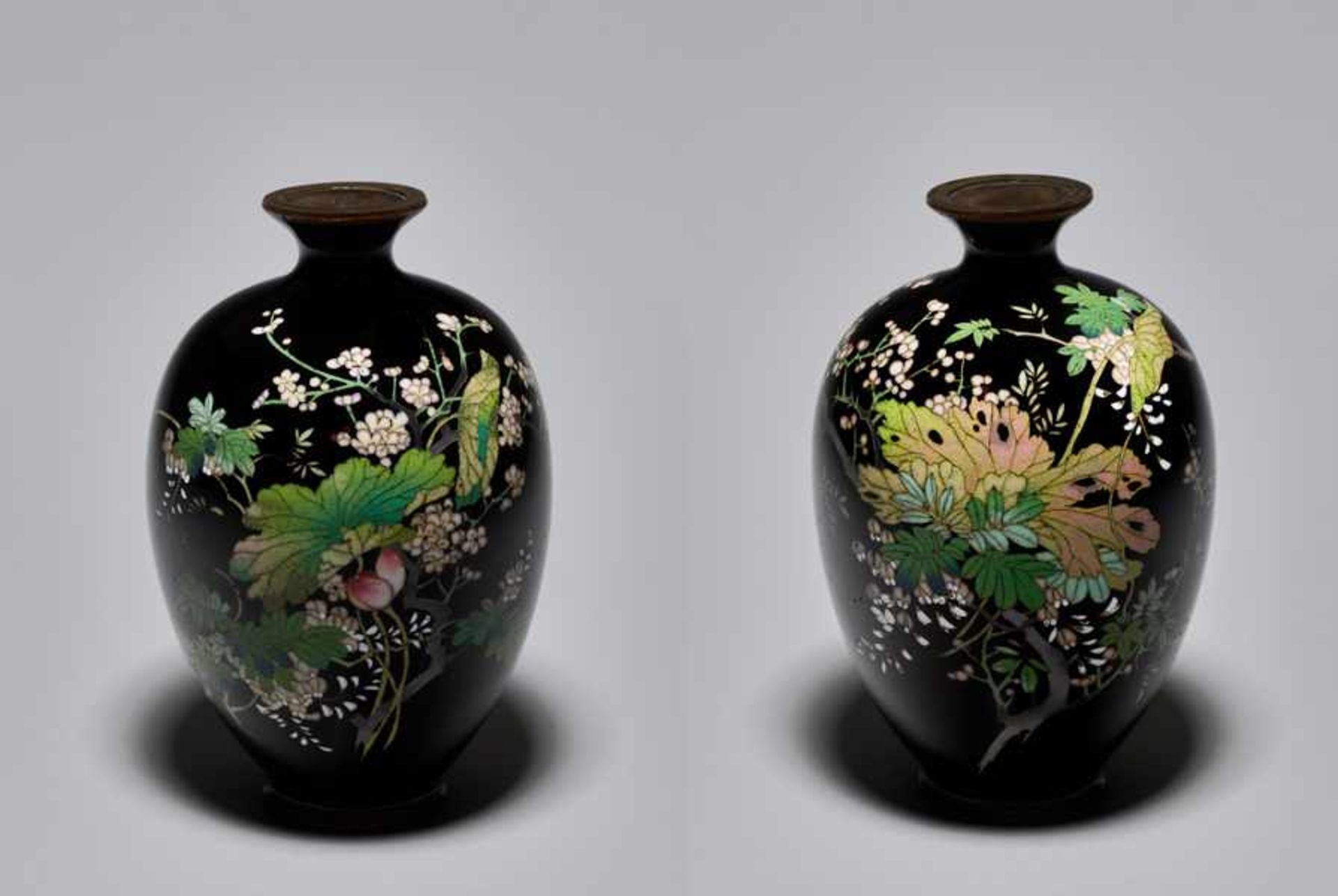 A PAIR OF SMALL CLOISONNÉ VASES WITH PLUM BLOSSOMS Colored enamel cloisonné. Japan, Meiji period