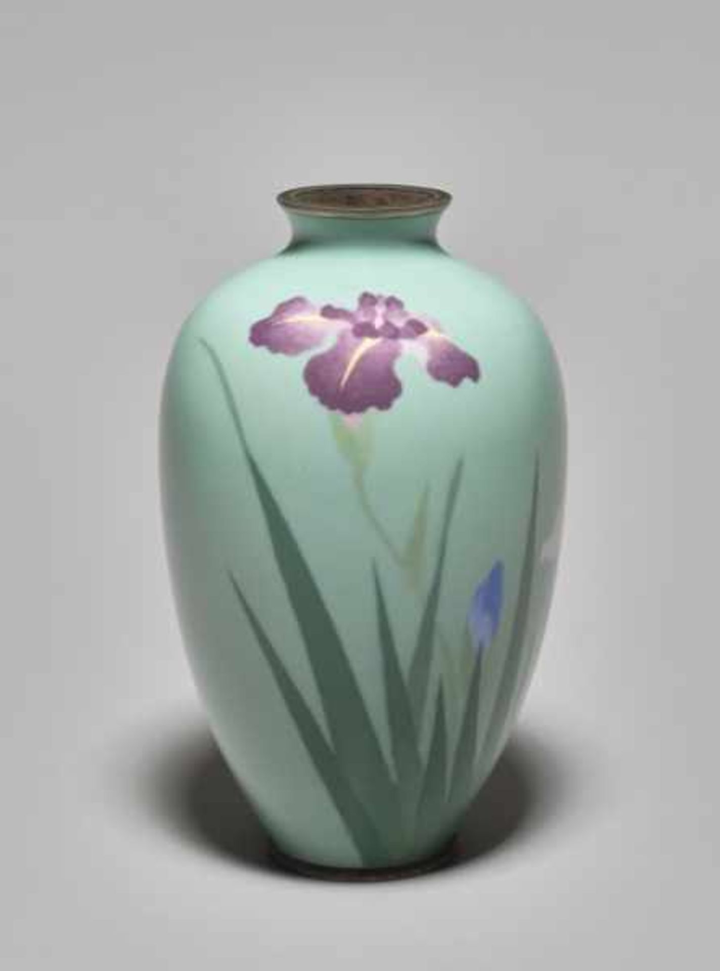 A CLOISONNÉ VASE WITH IRIS BLOSSOMS IN THE STYLE OF NAMIKAWA SOSUKE Colored enamel cloisonné on