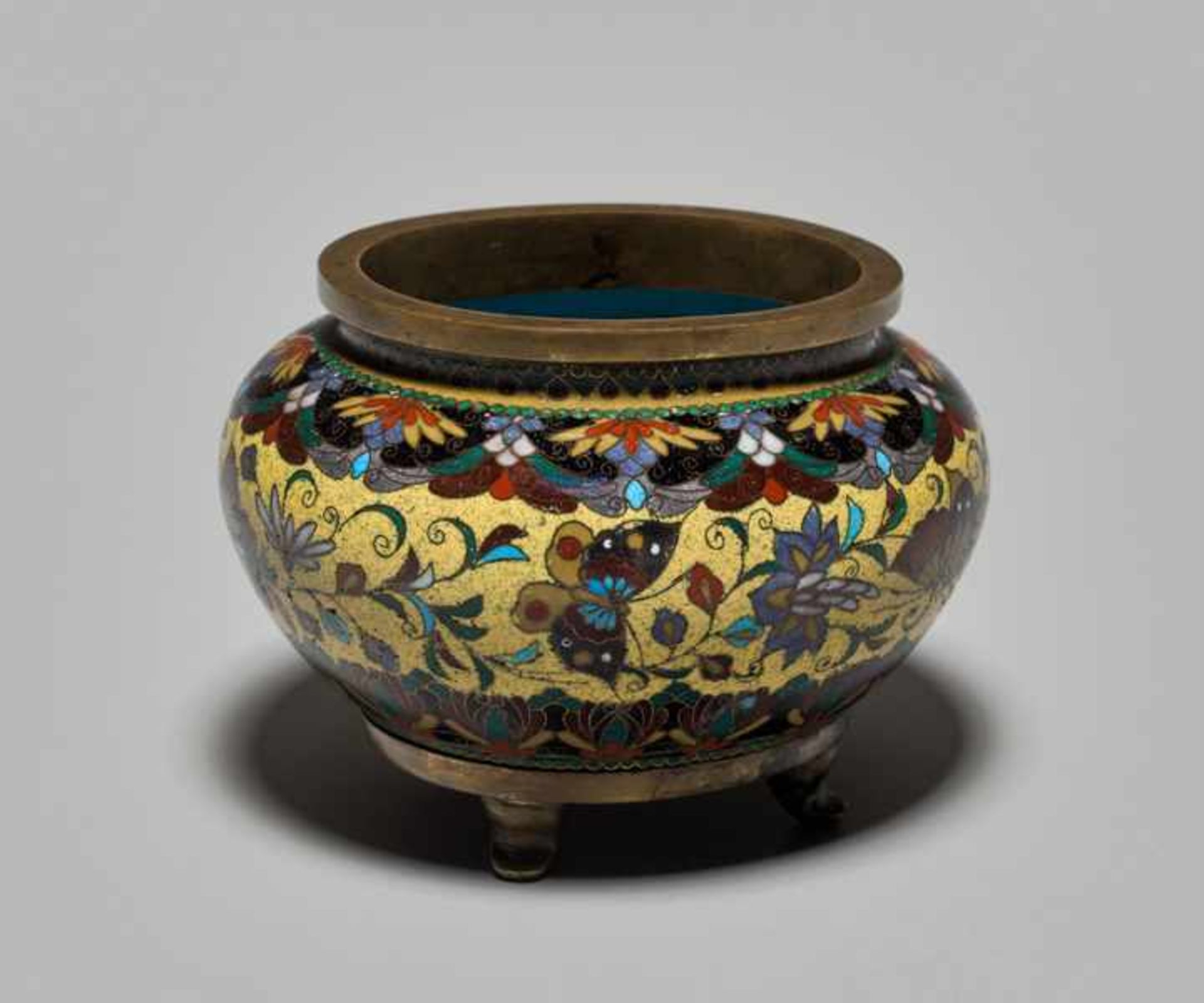 A CLOISONNÉ KORO WITH BLOSSOMS AND BUTTERFLIES IN THE STYLE OF NAMIKAWA YASUYUKI Colored enamel