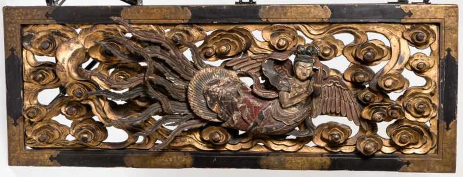 A VERY LARGE AND ELABORATE LACQUERED WOOD PANEL WITH TENNIN (BUDDHIST ANGEL) Wood, brass and