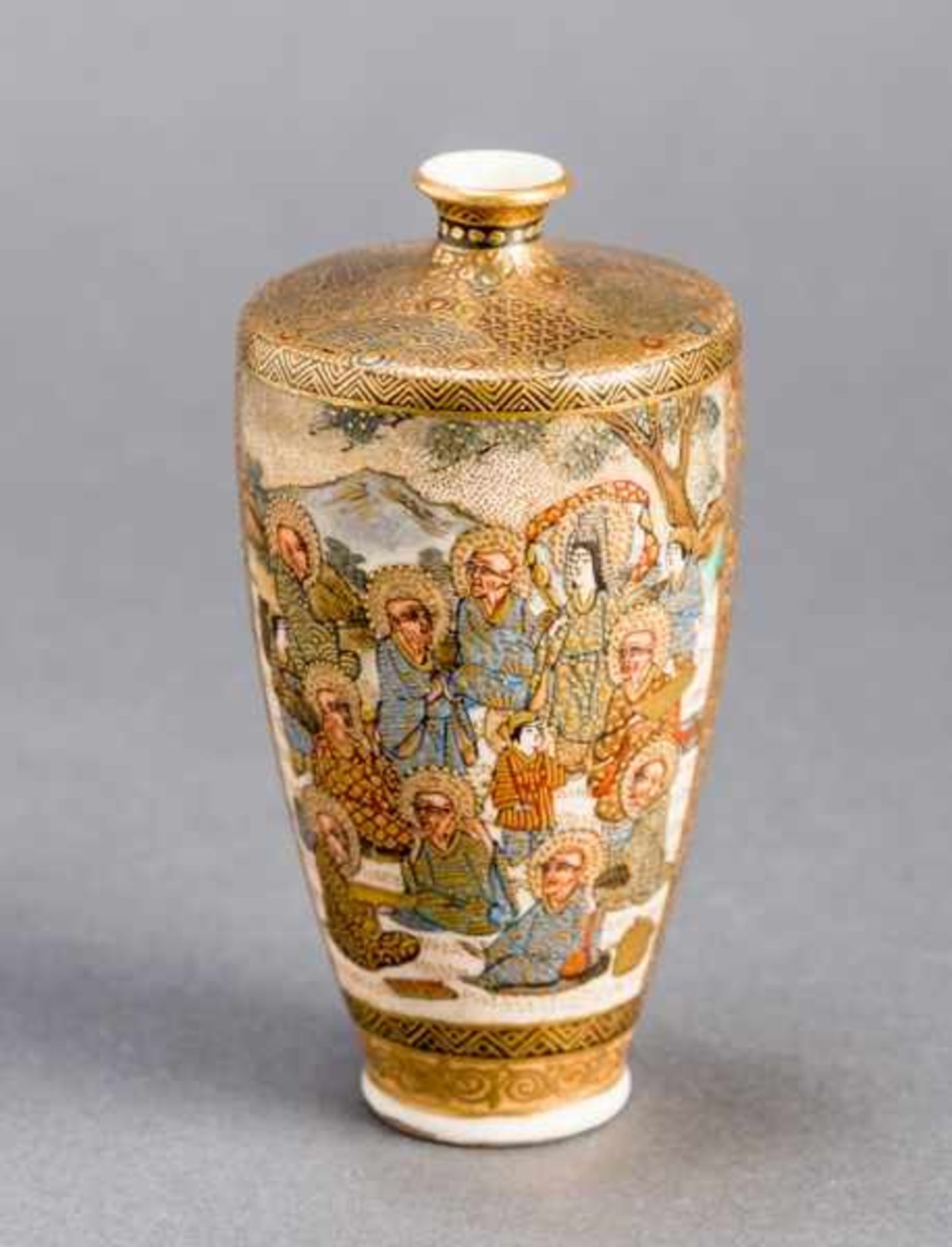 HODODA: A SMALL SATSUMA VASE WITH SAINTS Glazed ceramic with paint and gold. Japan, Meiji