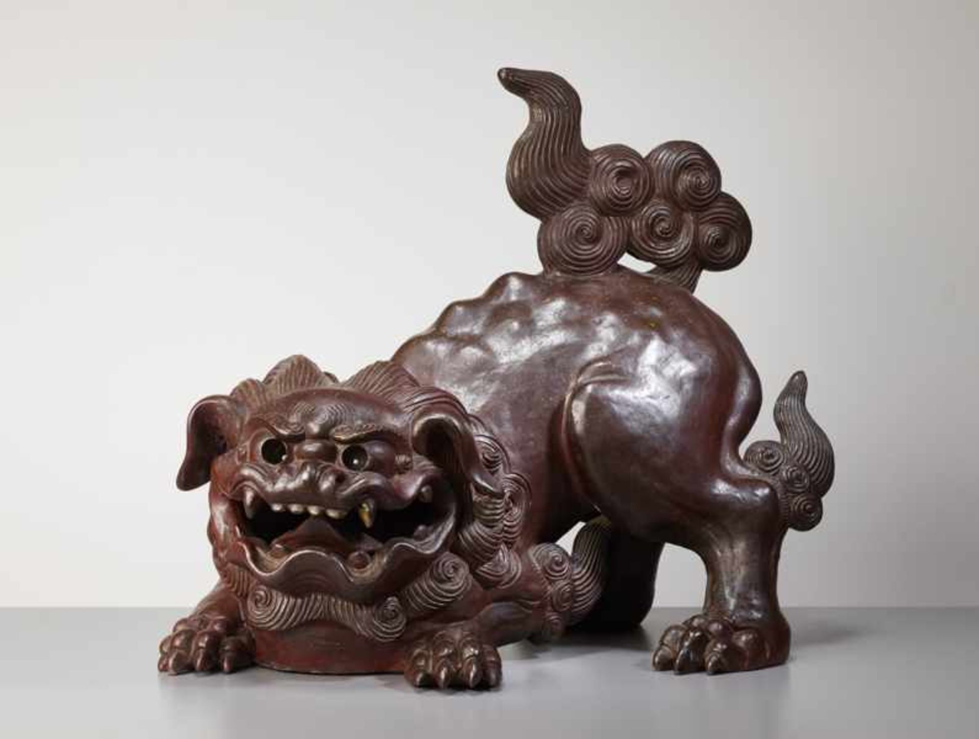 SCULPTURE OF A HISSING SHISHI Fired ceramic. Japan, Meiji periodExceptional and massive sculpture of