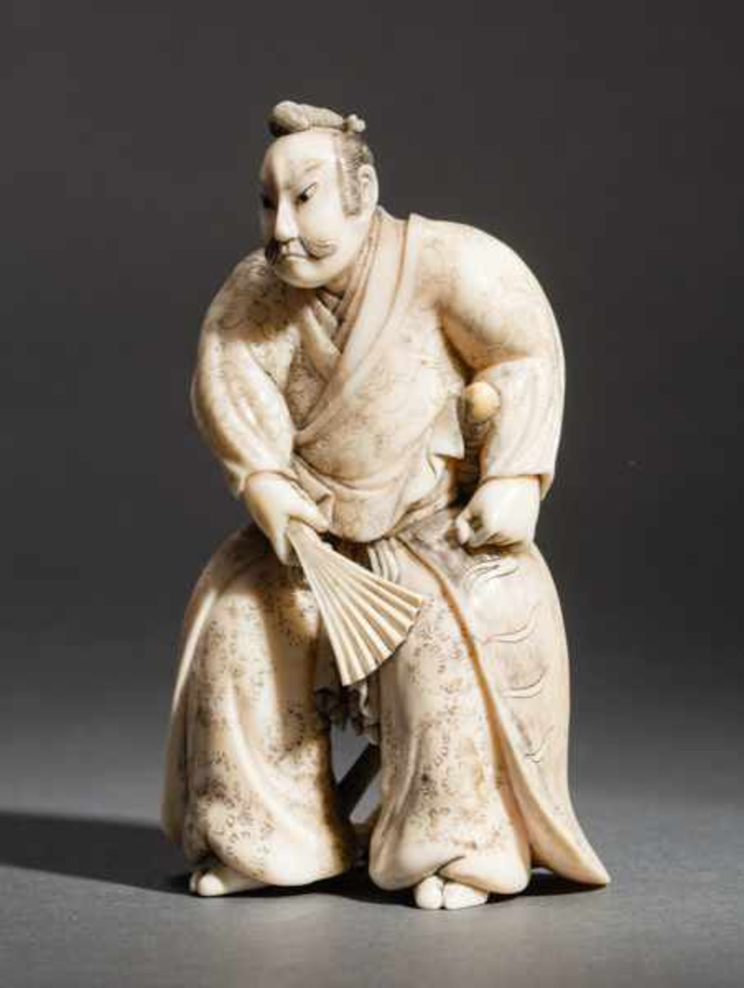 AN IVORY OKIMONO BY MASAJO OF A SAMURAI Ivory okimono. Japan, Meiji periodThis okimono shows a - Image 2 of 8