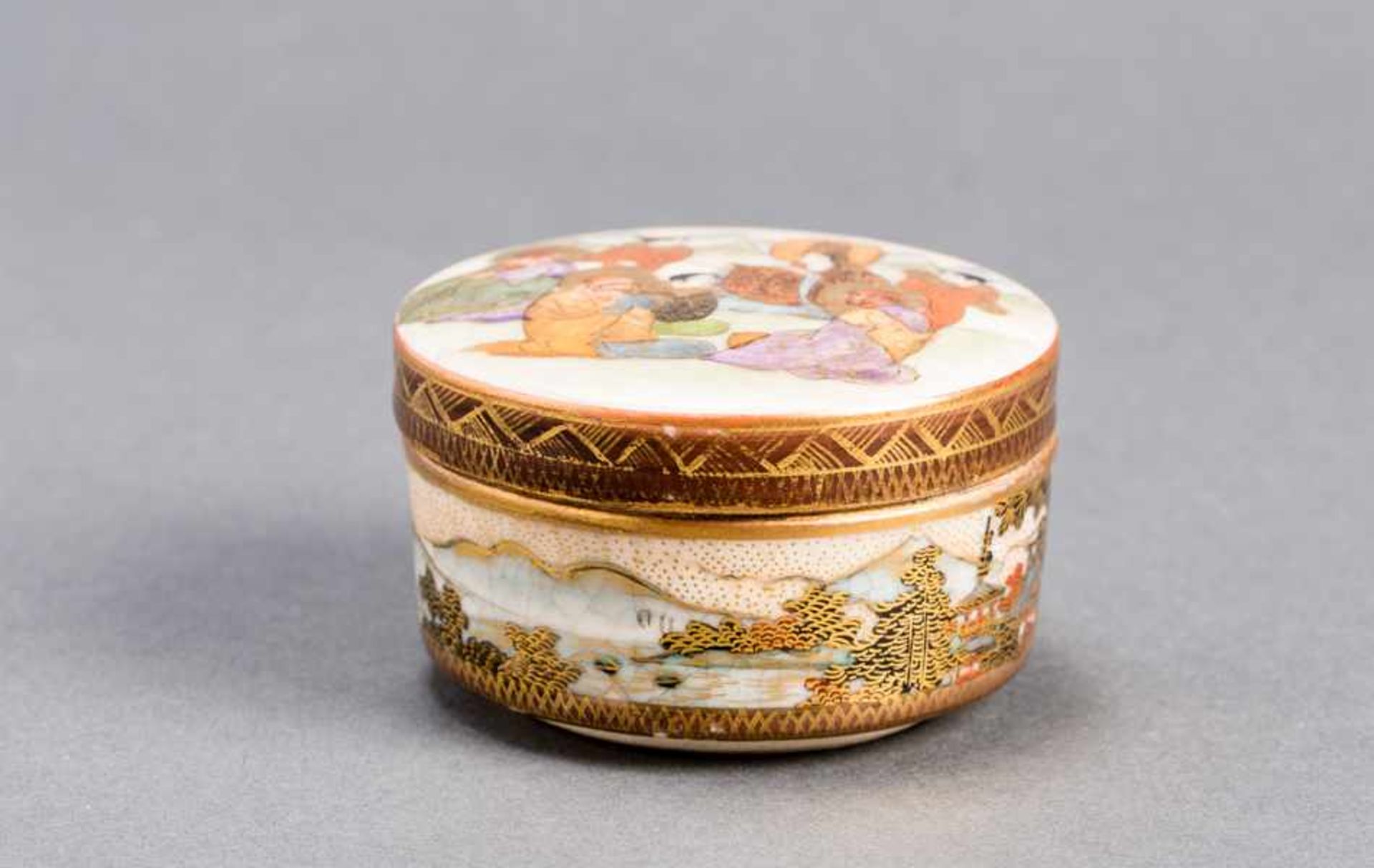 KYOKUZAN: LIDDED SATSUMA JAR WITH KANNON Glazed ceramic with paint and gold. Japan, Meiji periodOn