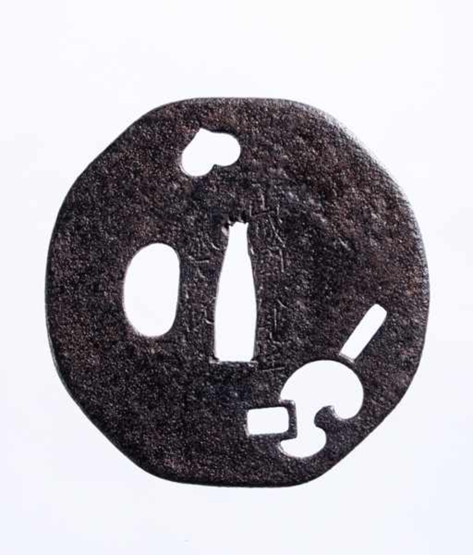 AN IRON SUKASHI TSUBA Iron. Japan, Muromachi period or afterYatsu mokko, a slight octagon/circular - Image 2 of 2