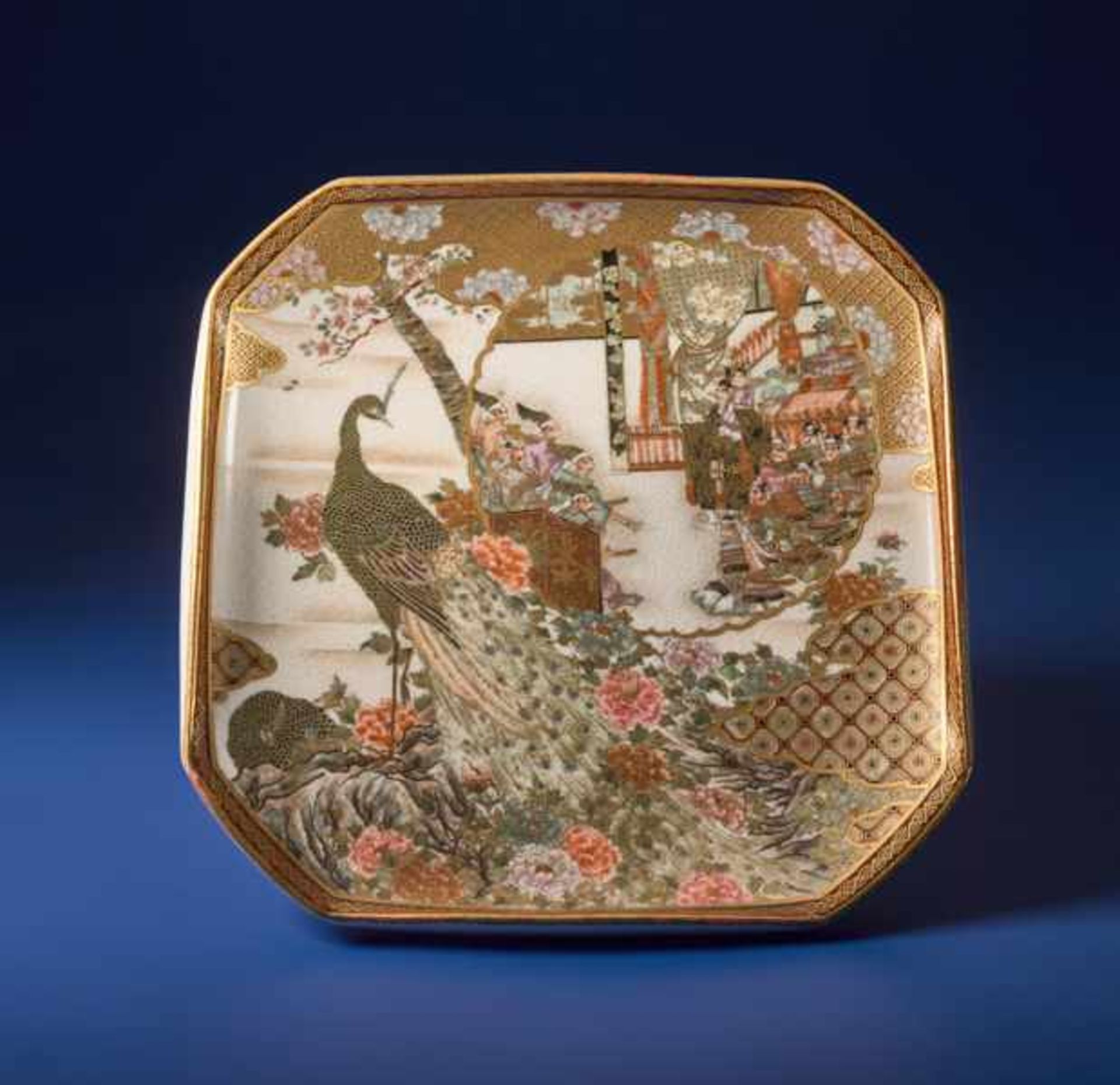 KINZAN: SATSUMA PLATE WITH PEACOCK Glazed ceramic with paint and gold. Japan, Meiji
