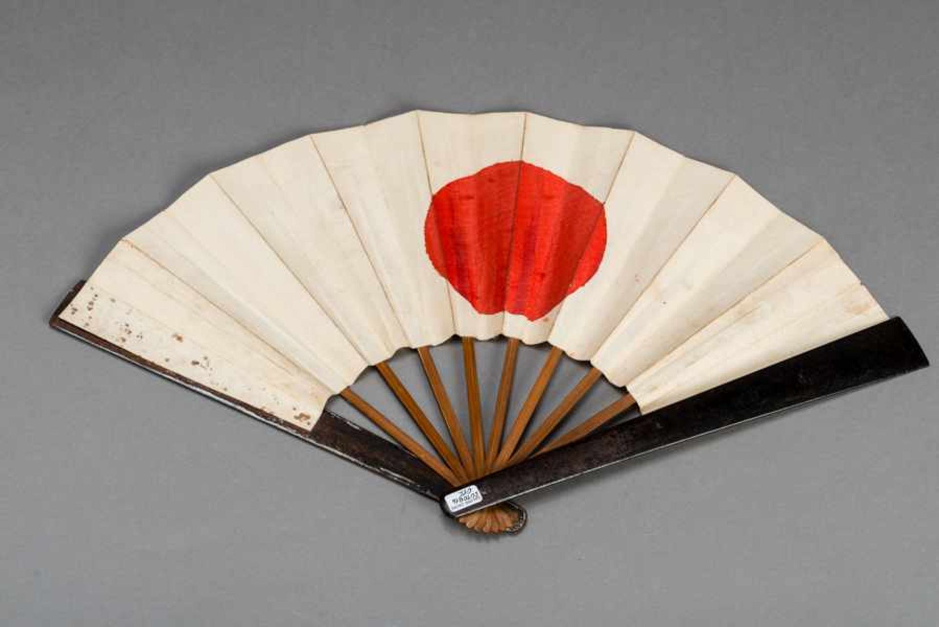 AN IRON WAR FAN (TESSEN) Iron, bamboo, paper and paint. Japan, Edo periodAn iron battle fan used