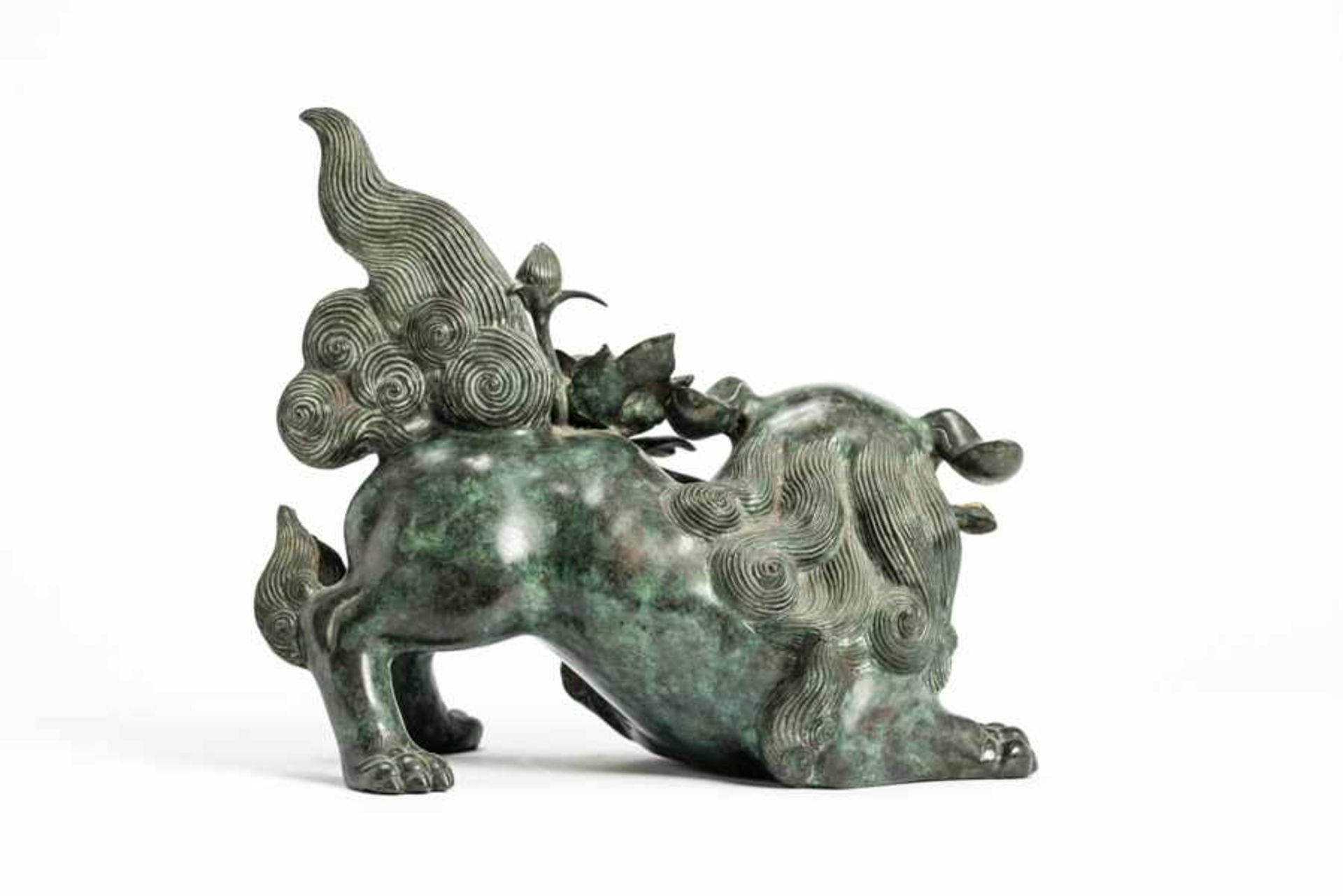 A BRONZE SHISHI Bronze with gilding. Japan, 19th centuryOf beautiful greenish patina, the former - Image 4 of 9