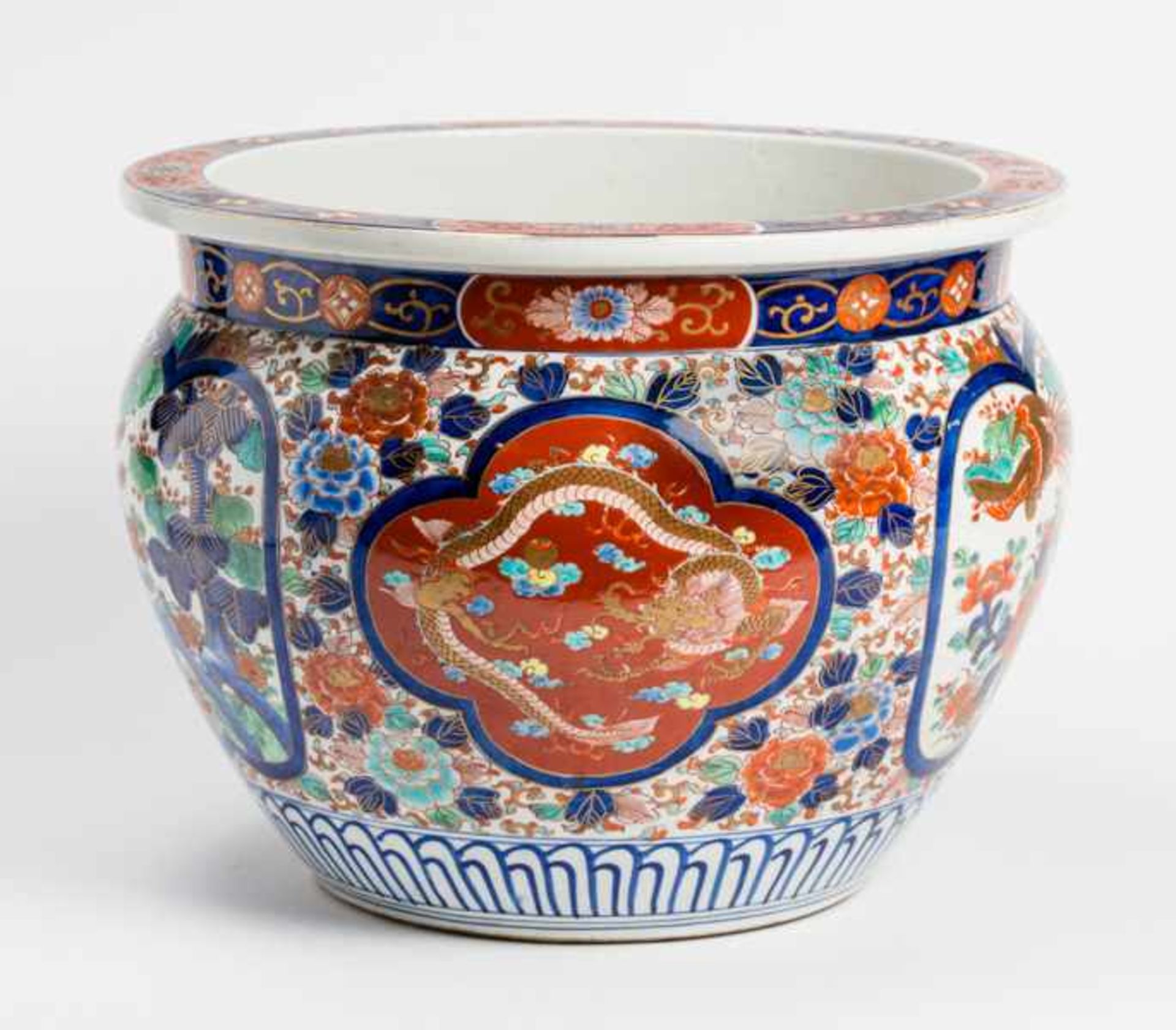 AN ELABORATELY ADORNED IMARI CACHEPOT Porcelain with enamel painting. Japan, Meiji period around