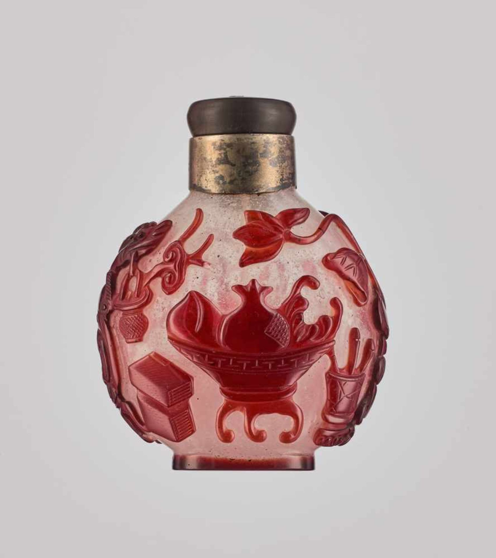 A RUBY-RED OVERLAY WHITE GLASS 'AUSPICIOUS OBJECTS' SNUFF BOTTLE, QING DYNASTY Carved and incised - Image 2 of 6