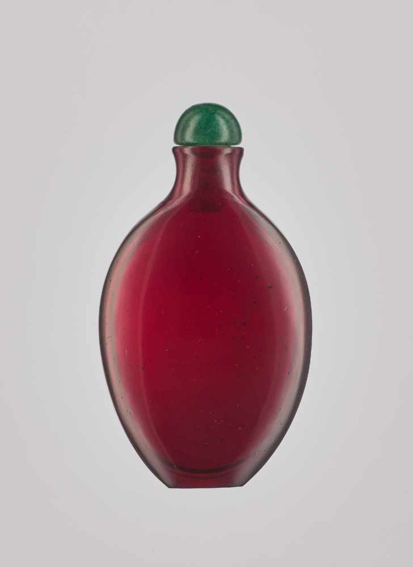 A PLAIN FACETED RUBY-RED GLASS SNUFF BOTTLE, QING DYNASTY Plain glass body with only few small