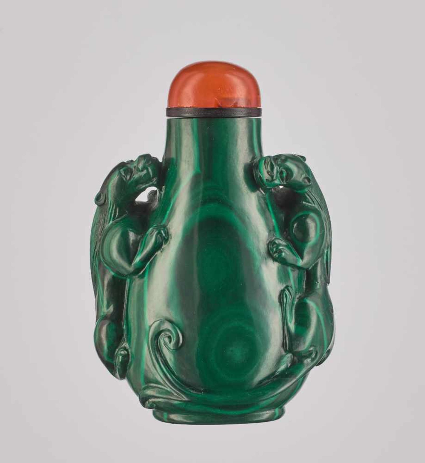 A CARVED ‘CHILONG’ THUMBPRINT MALACHITE SNUFF BOTTLE, QING DYNASTY Malachite with expressive