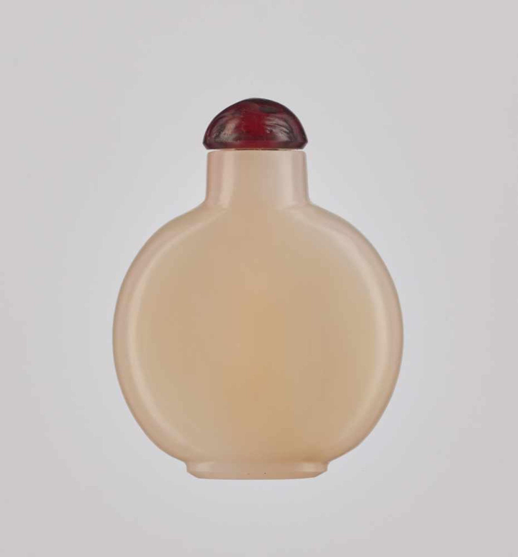 A GLASS 'JADE-IMITATION' DISK-SHAPED SNUFF BOTTLE, QING DYNASTY Glass of even, creamy-white color in