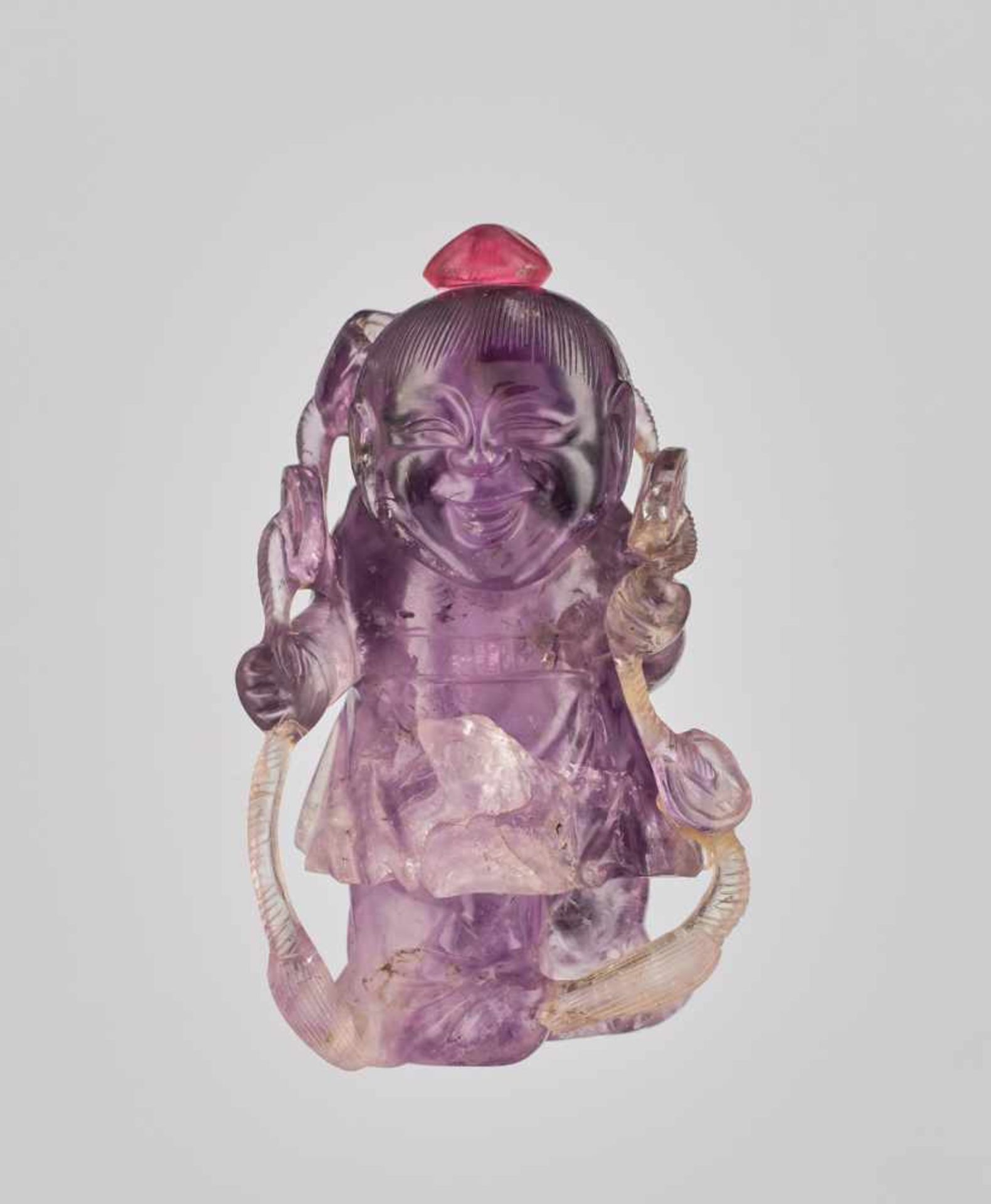 A FIGURAL ‘LIU HAI AND TOAD’ AMETHYST SNUFF BOTTLE Amethyst, the colors of the transparent crystal