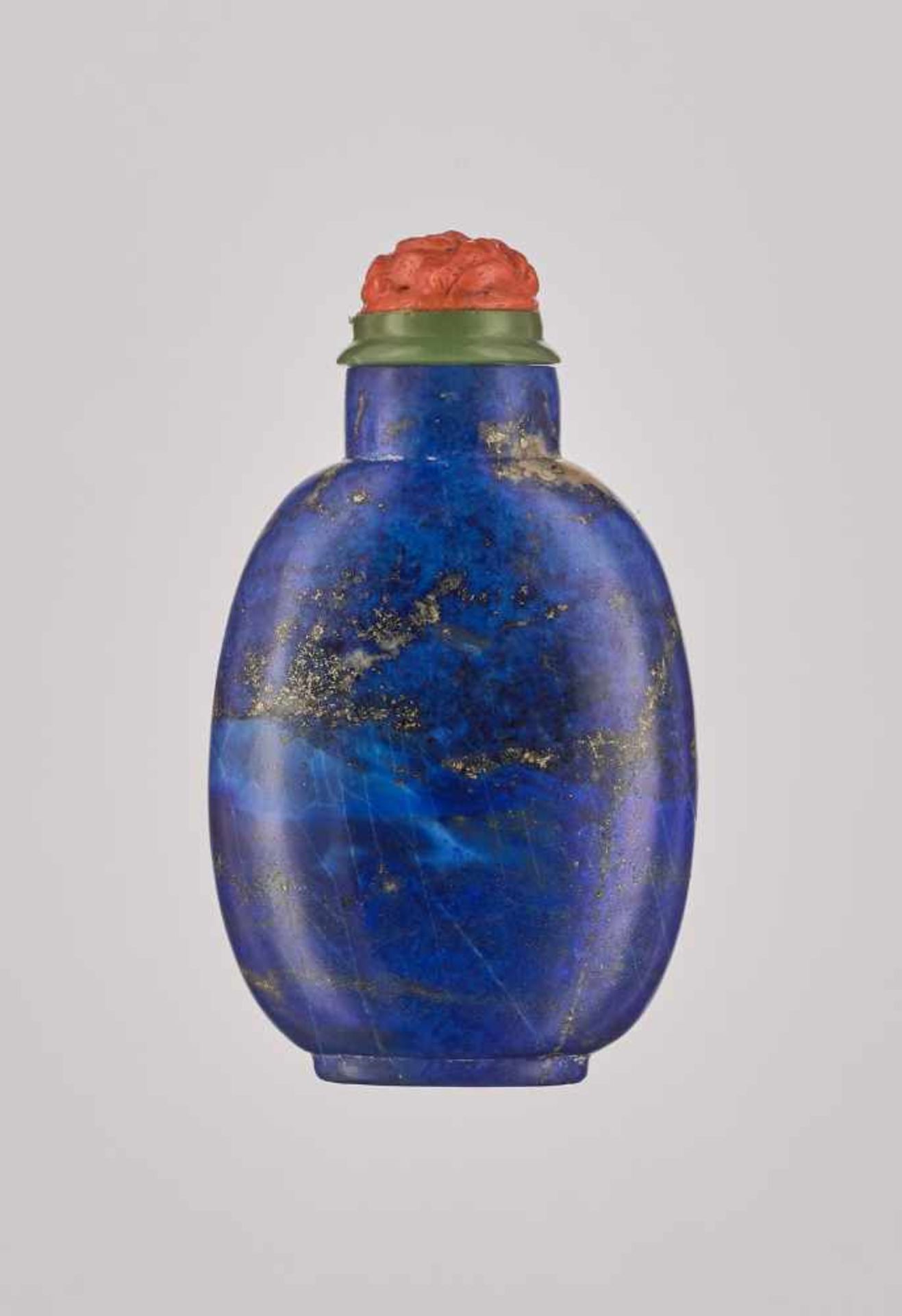 A LAPIS LAZULI SNUFF BOTTLE, QING DYNASTY Carved Lapis lazuli with a good patina and smooth