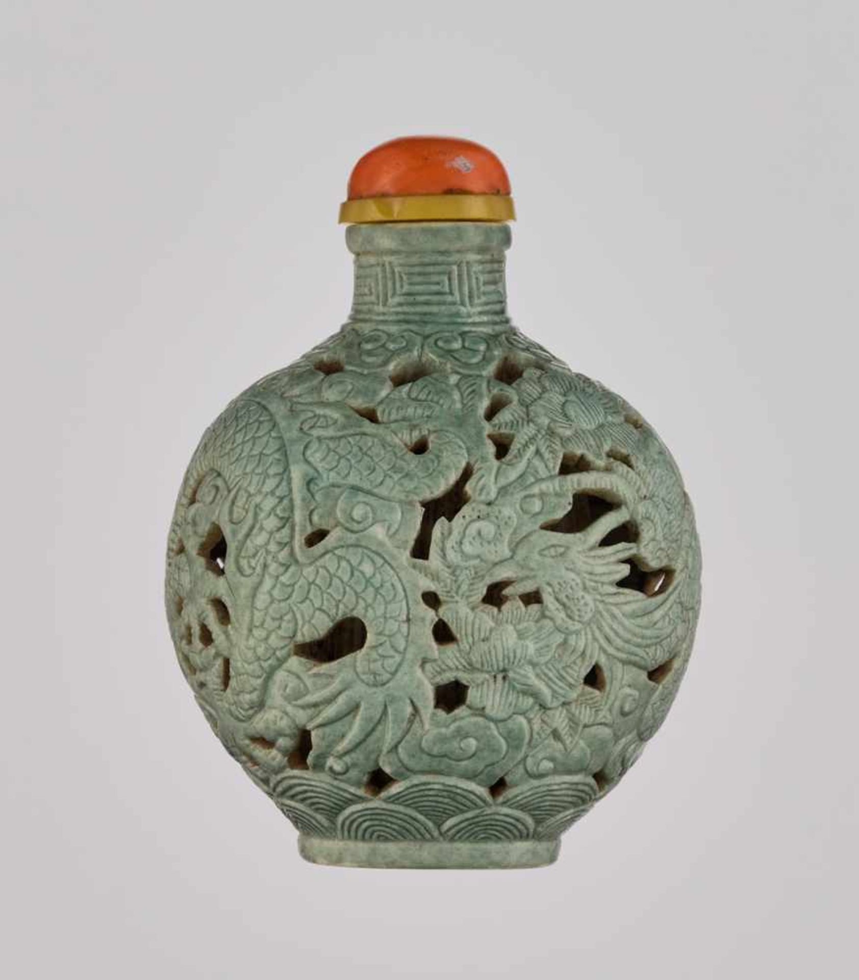 A RETICULATED TURQUOISE-GLAZED ‘DRAGON & PHOENIX’ PORCELAIN SNUFF BOTTLE Molded and carved porcelain - Image 2 of 6