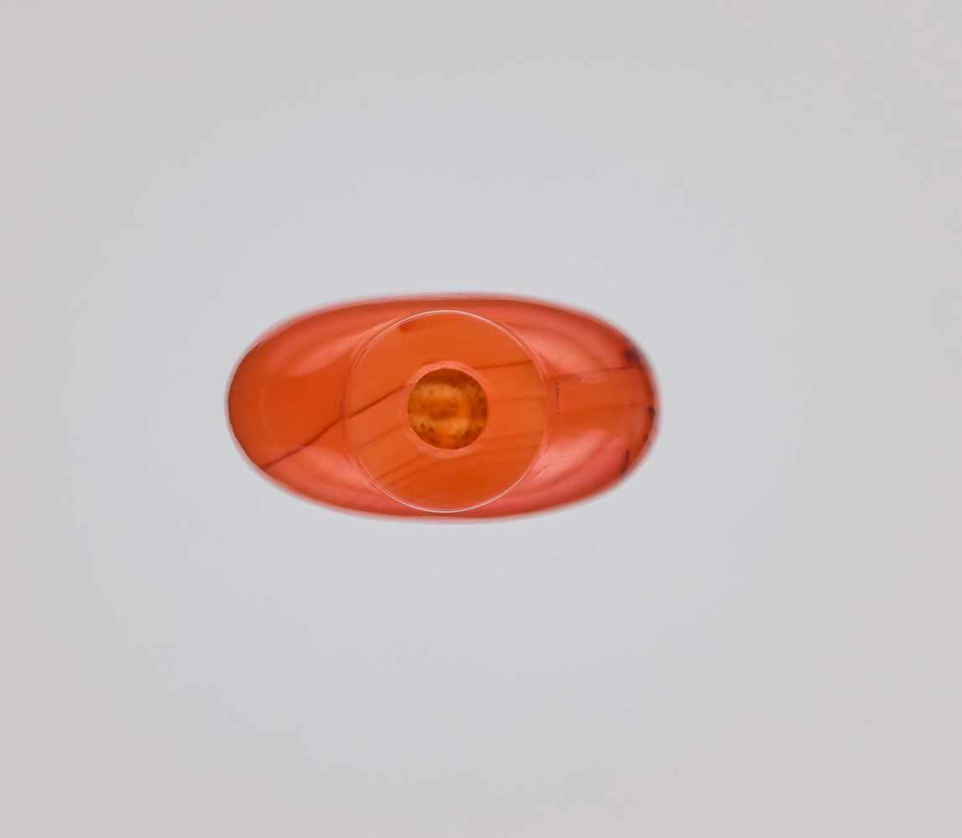 A SMALL PLAIN CARNELIAN SNUFF BOTTLE, QING DYNASTY Plain carnelian of deep orange, almost amber-like - Image 5 of 6